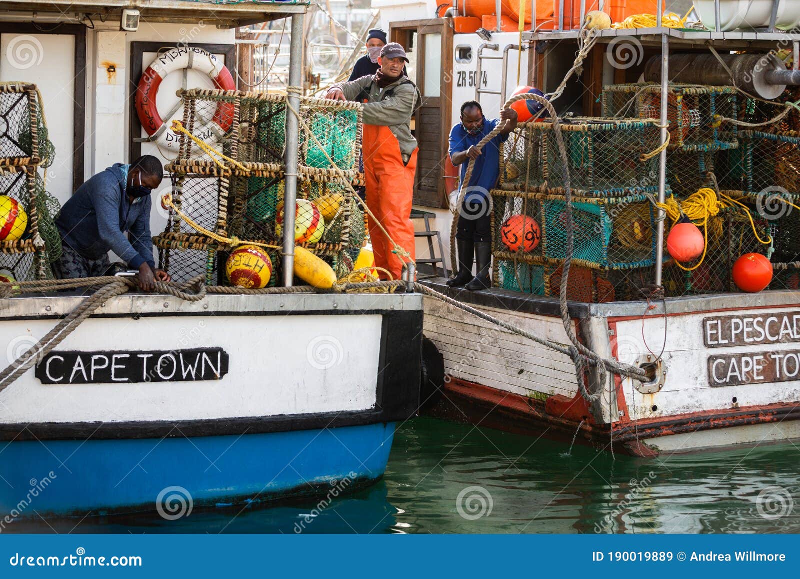 Fishermen in Kalk Bay Harbour during Pandemic Editorial Stock