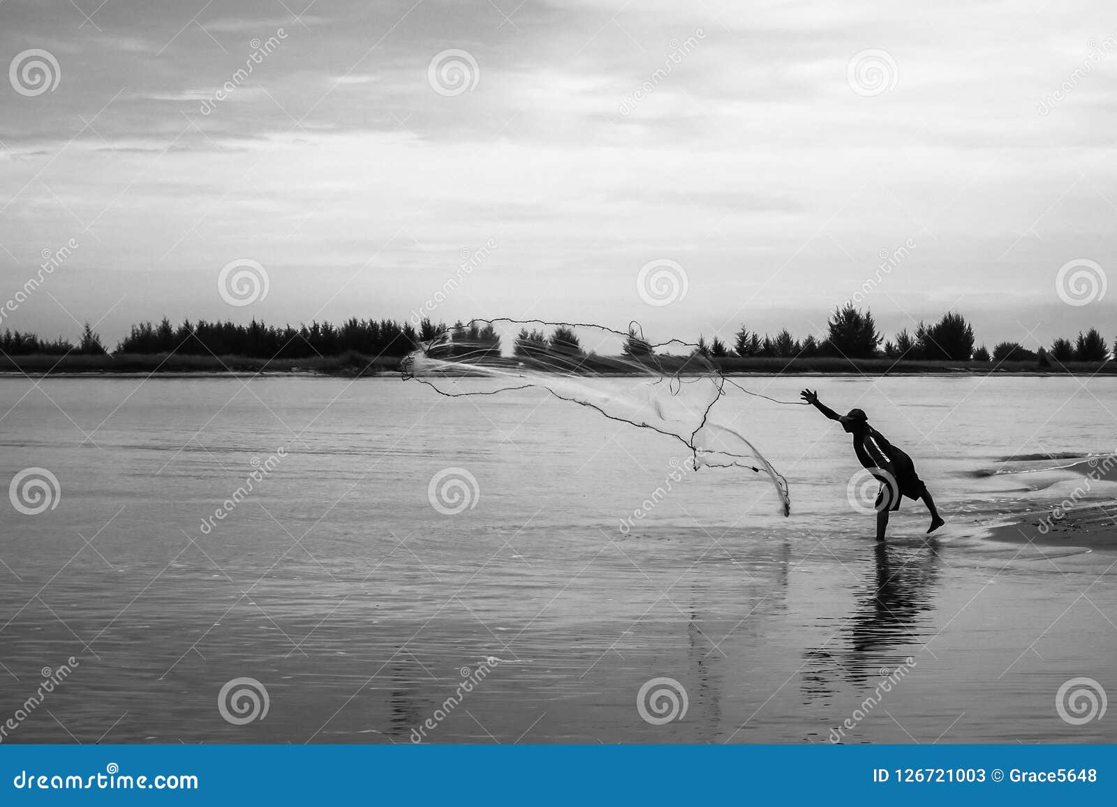 Fishermen Throw a Fishing Net To Catch Fishes Editorial Stock