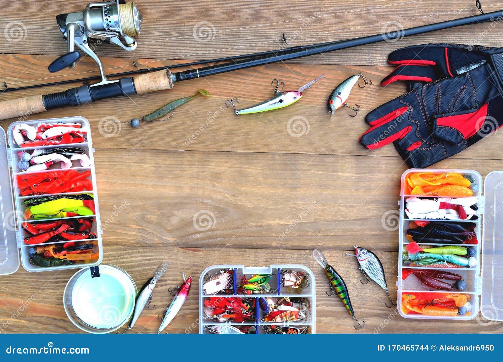 Fishing Accessories Fishing Rod, Reel with Fishing Line, Silicone Baits and  Lures, Spinning Gloves and Accessory Box on a Wooden Stock Photo - Image of  instrument, float: 170465744