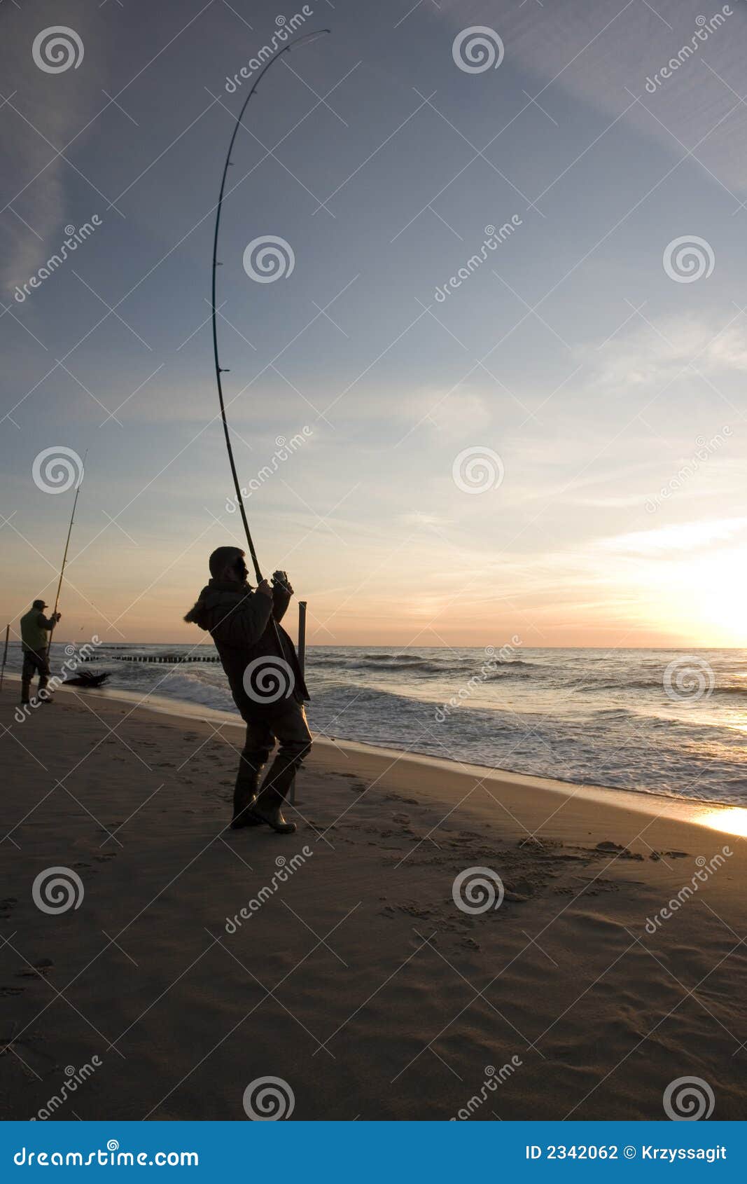 Fishing on beach stock photo. Image of pole, fish, early - 2342062