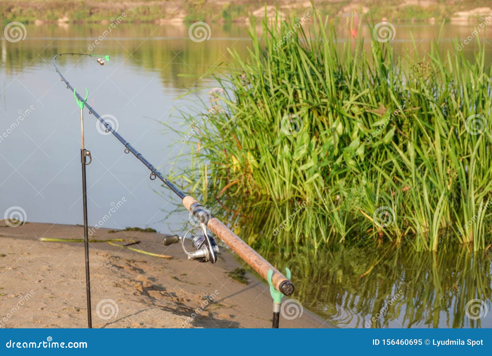 Fishing Bell at the End of a Fishing Rod. Bells Will Ring when the