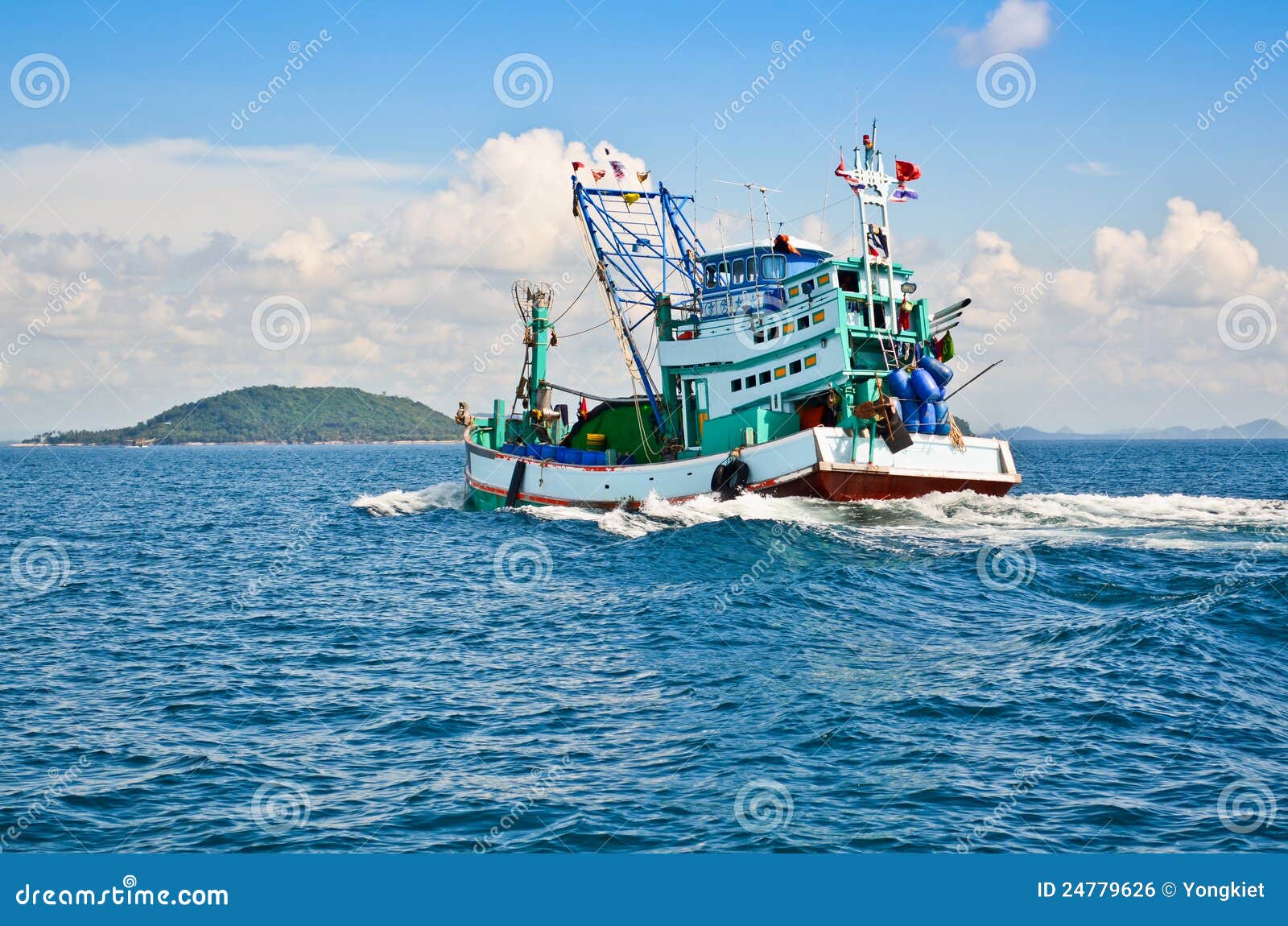 Fishing boat was sailing back to shore.