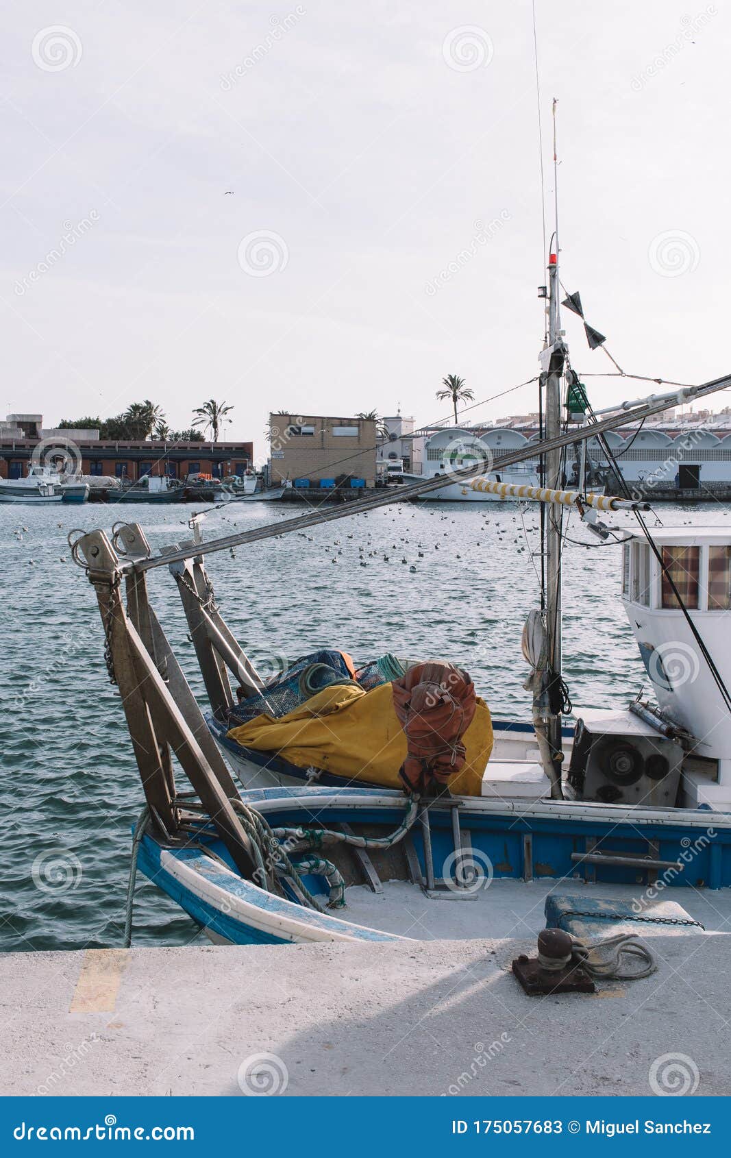 Fishing boat near the pier stock image. Image of fasten ...
