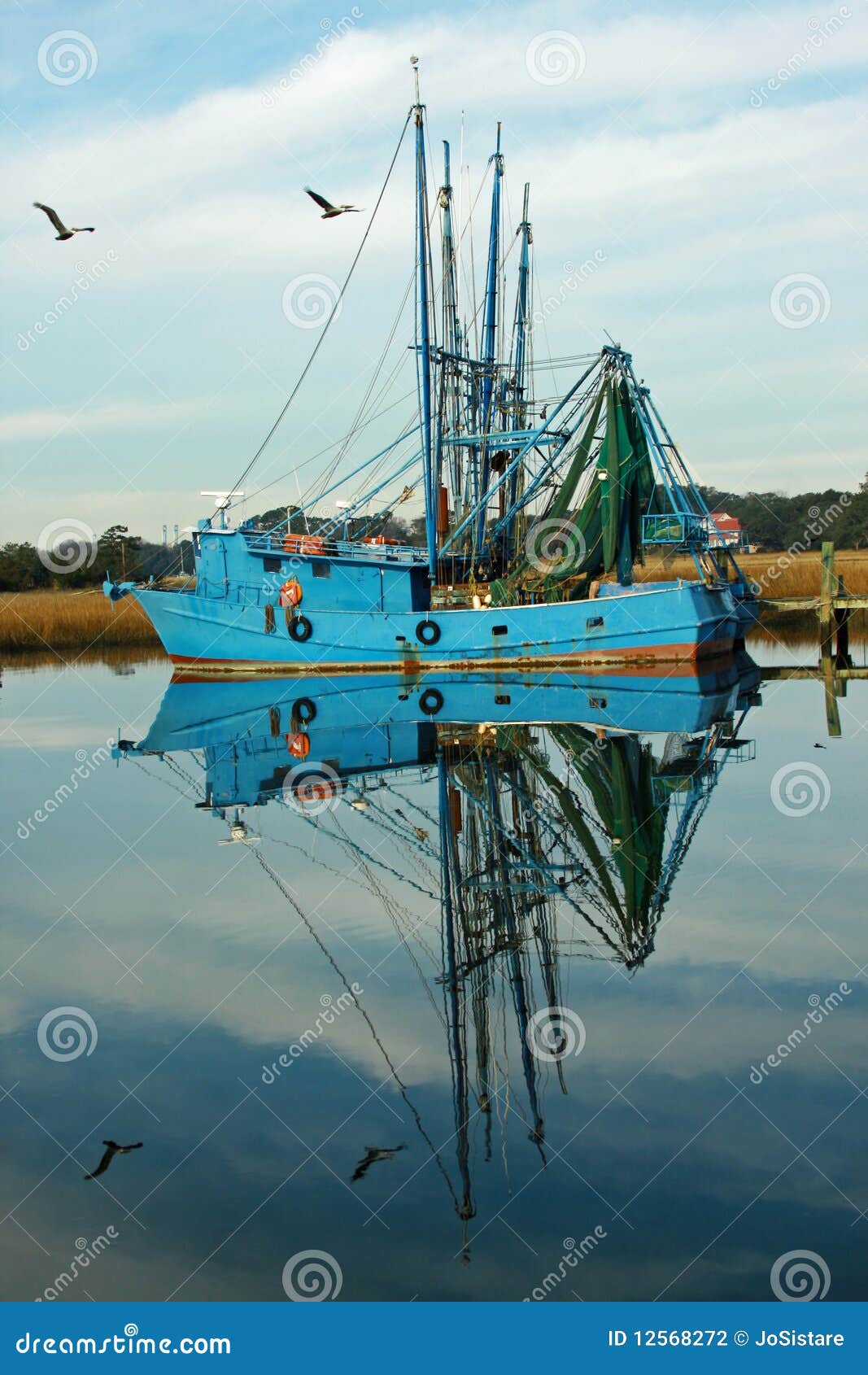 fishing boat reflections stock photography - image: 12568272