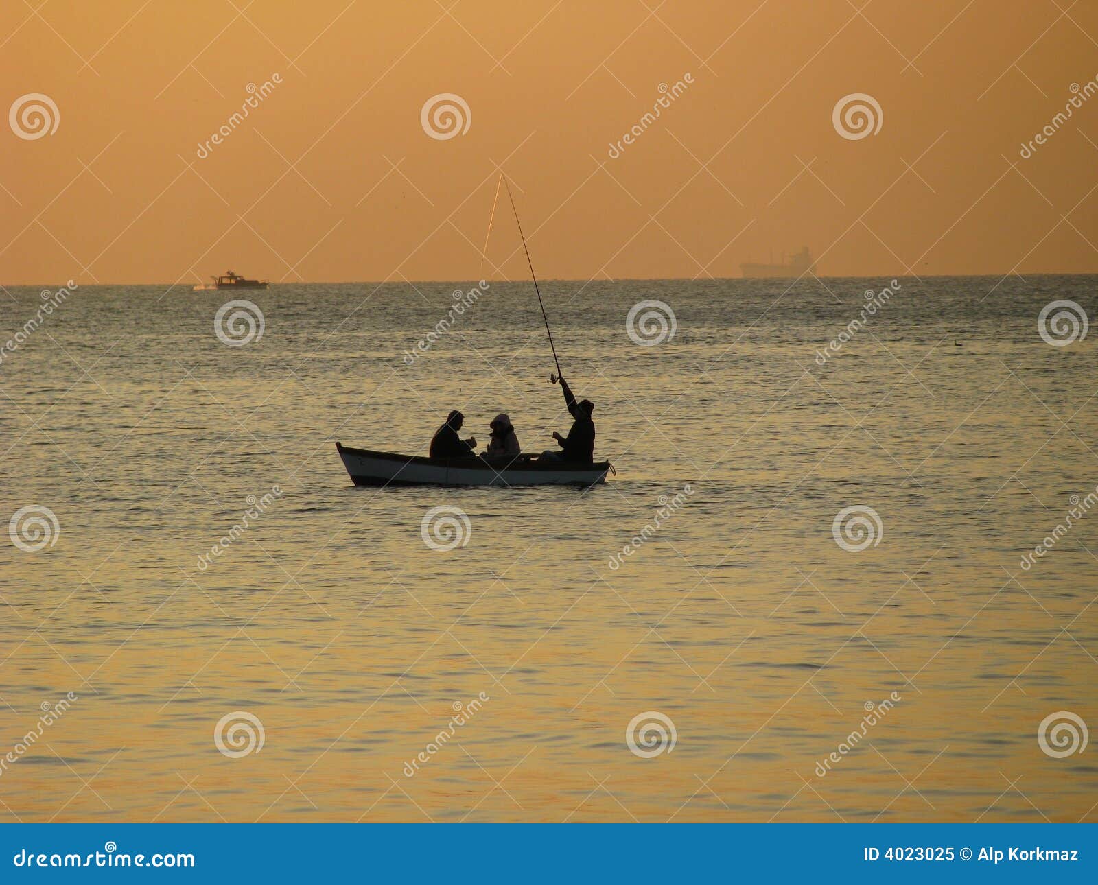 Fishing Boat    at Sunset stock image. Image of rowboat 