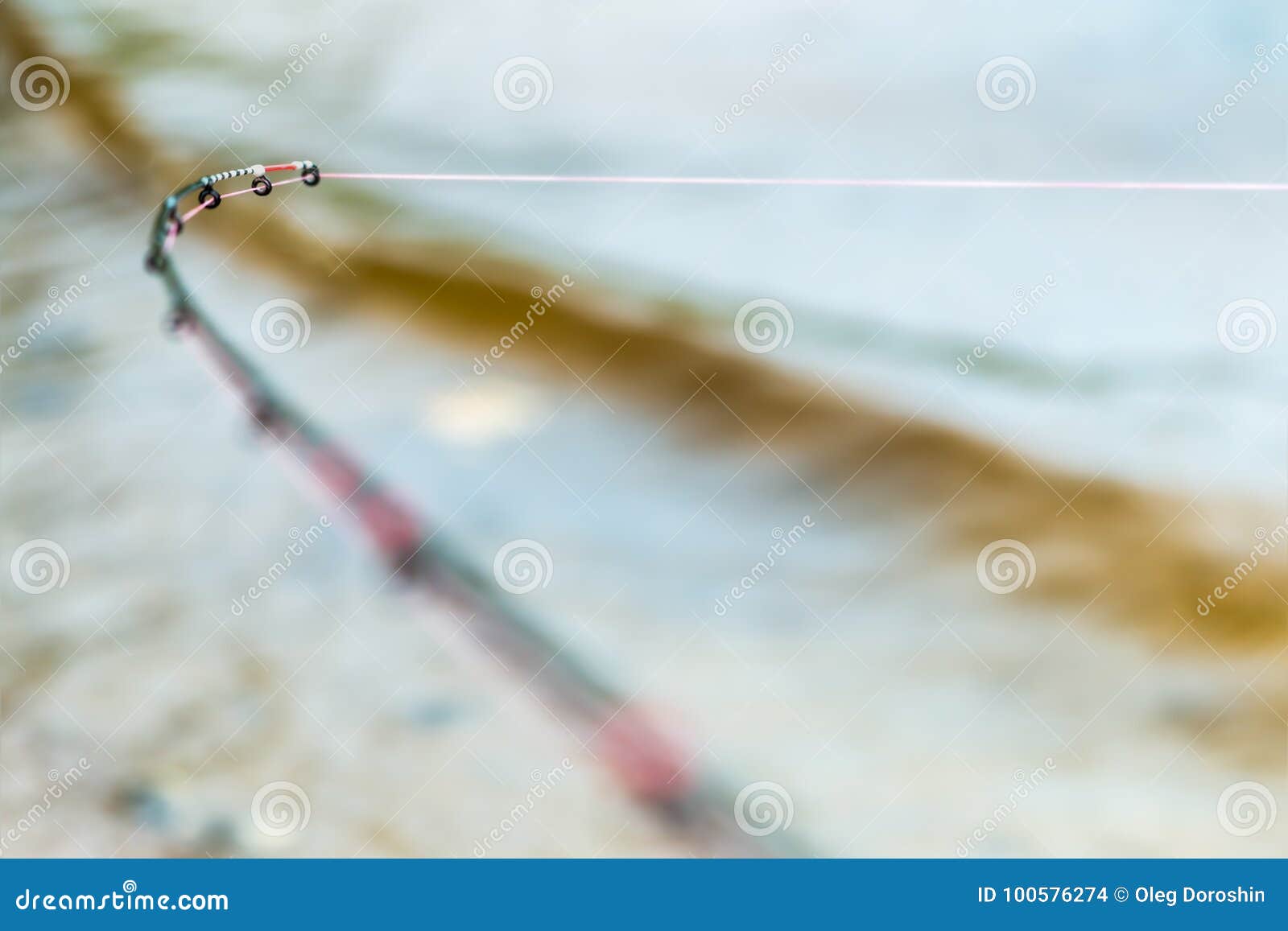 Fishing Feeder Rod with a Tight Line Indicates a Bite Stock Photo