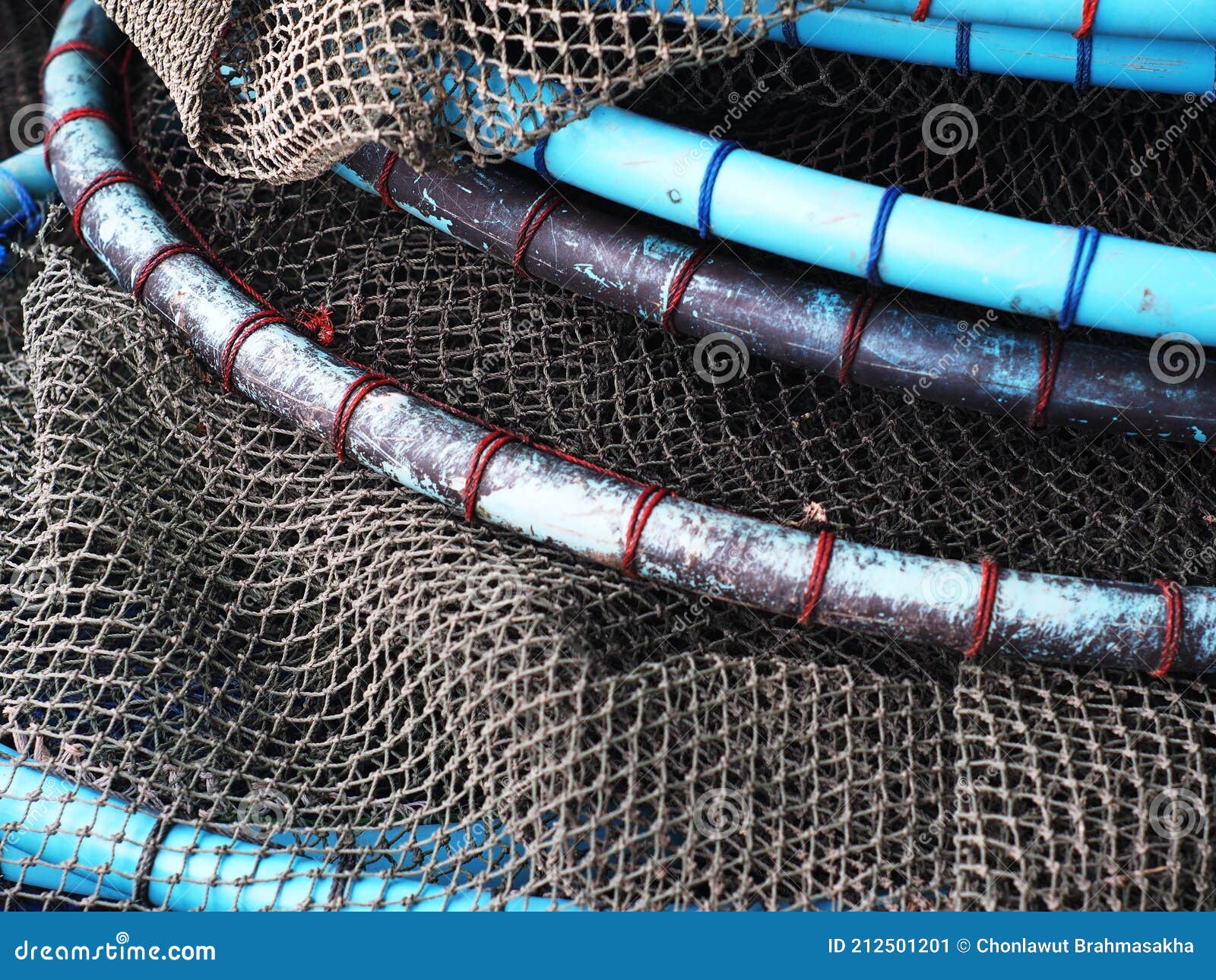 Fishing Fish Net Catcher Made of Dark Blue Green Rope and Blue PVC Pipes  Leaving To Dry after Use in a Shrimp Farm in Thailand Stock Image - Image  of netting, blue