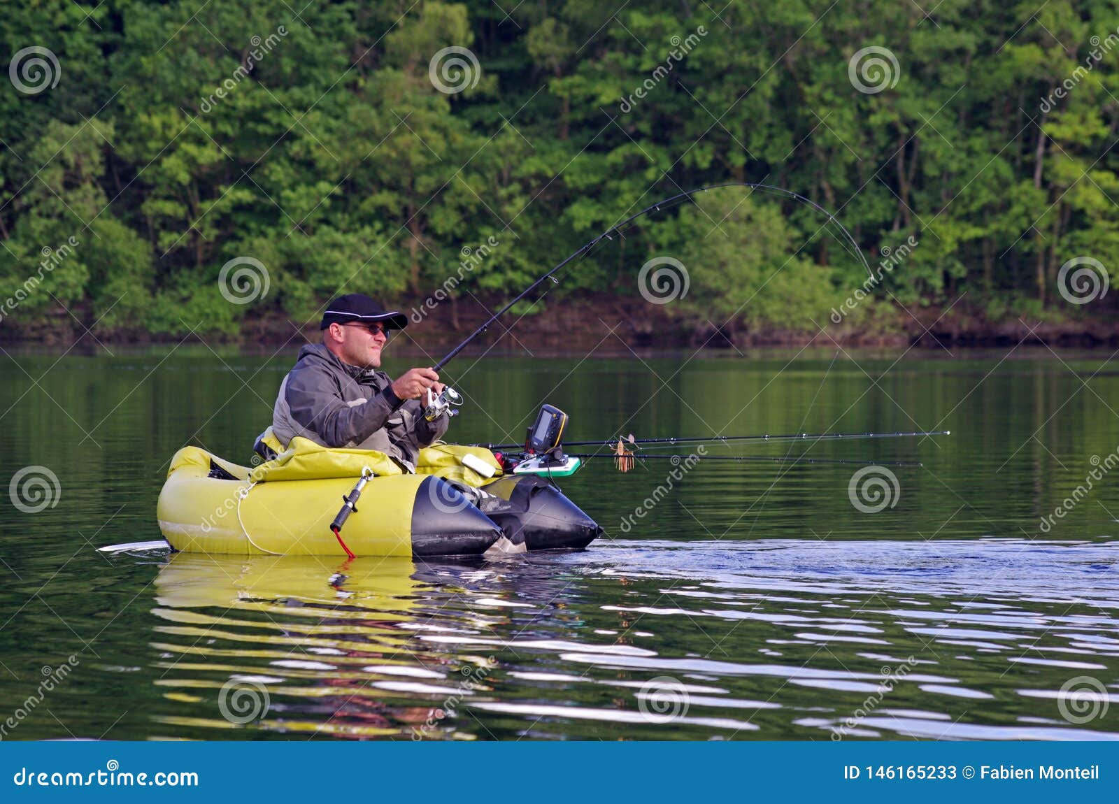 Fishing with a float tube stock image. Image of effort - 146165233