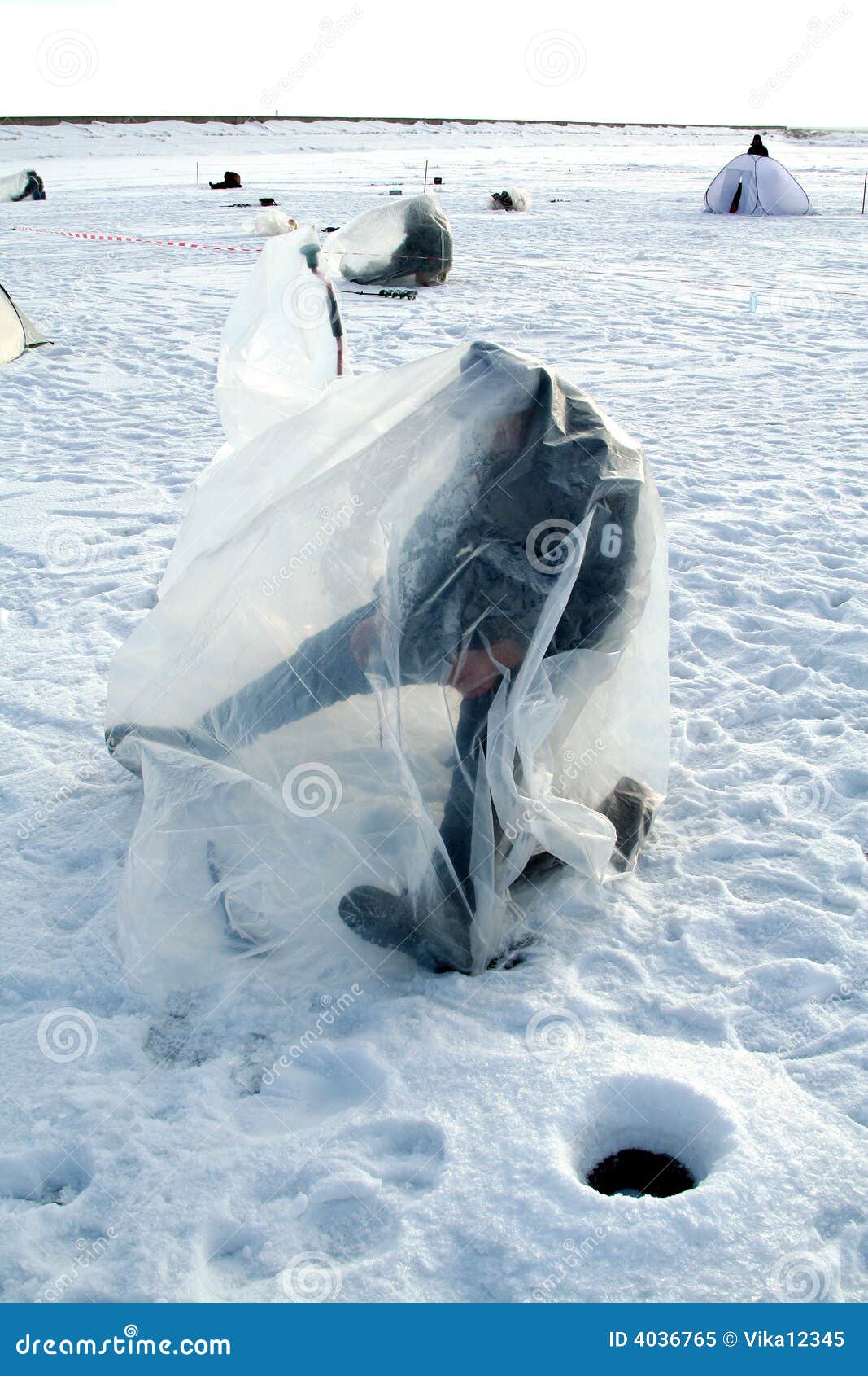 Fishing on frozen lake stock image. Image of horizon, frozen 4036765