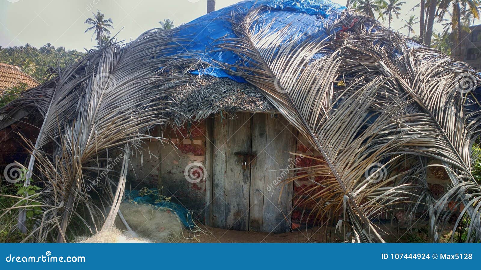fishing half dugout (pandal) covered with palm leaves
