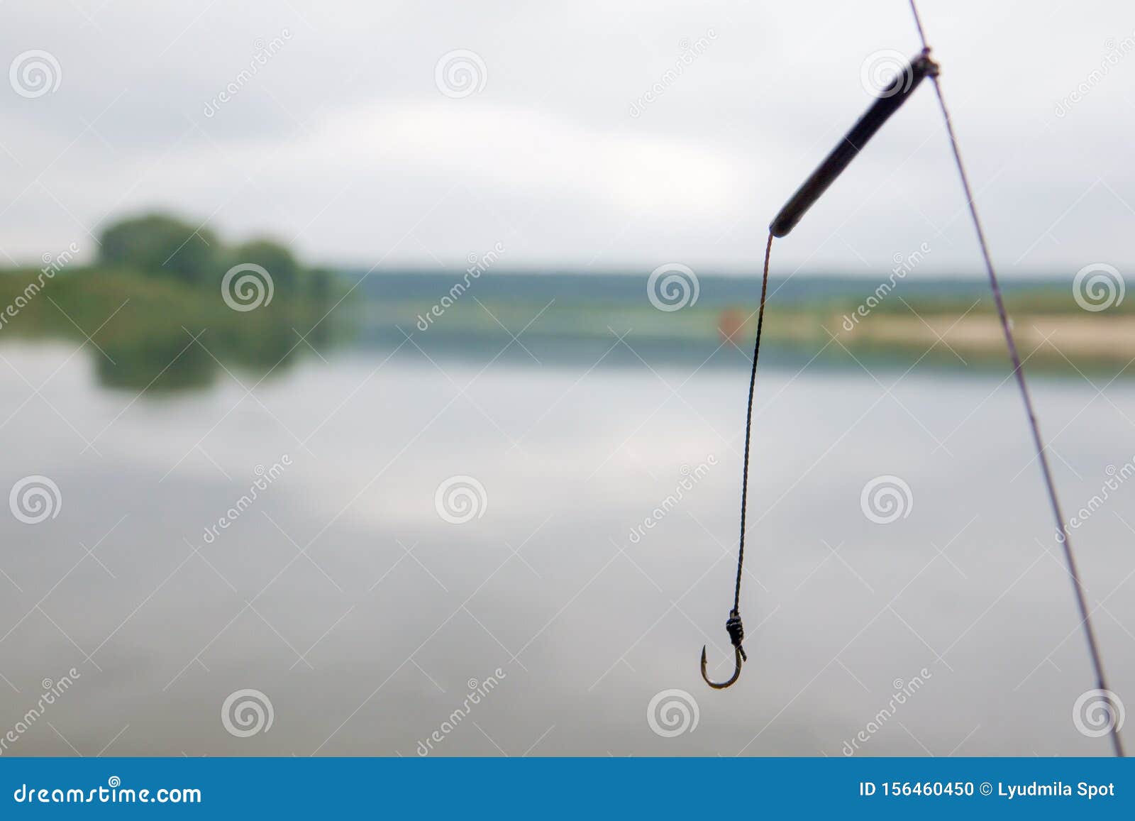 Fishing Hook on Water and Fishes on the River Stock Photo - Image