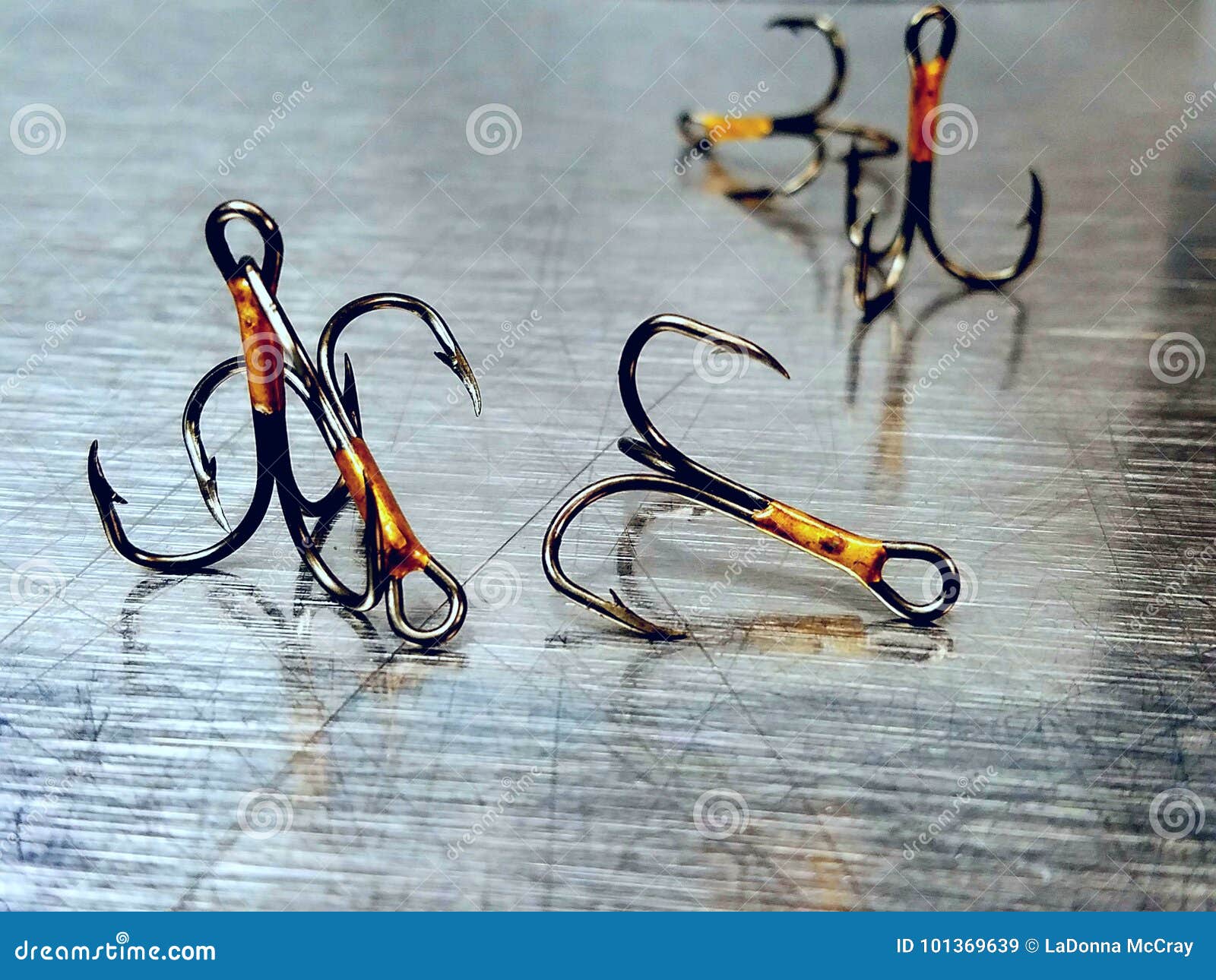 Reflection of Fishing Hooks Stock Image - Image of unhooked, prong:  101369639