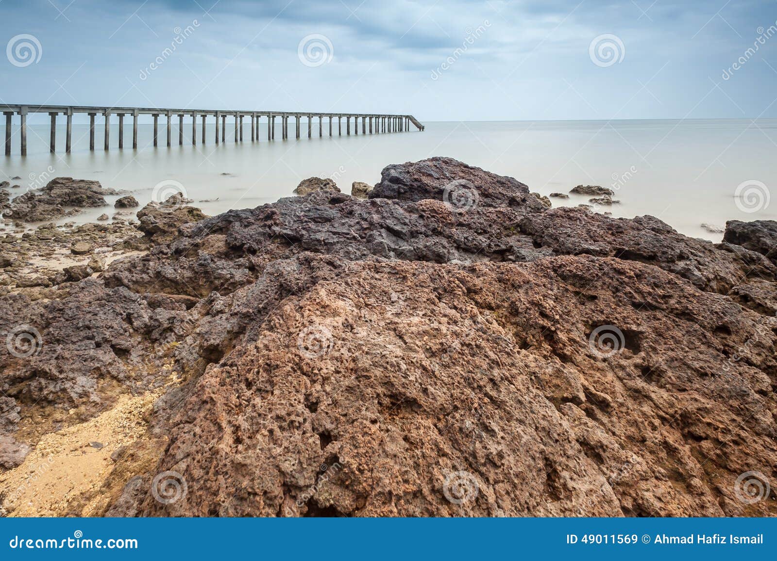 Boy Fishing On Jetty At Iluka In NSW Australia Royalty-Free Stock Image