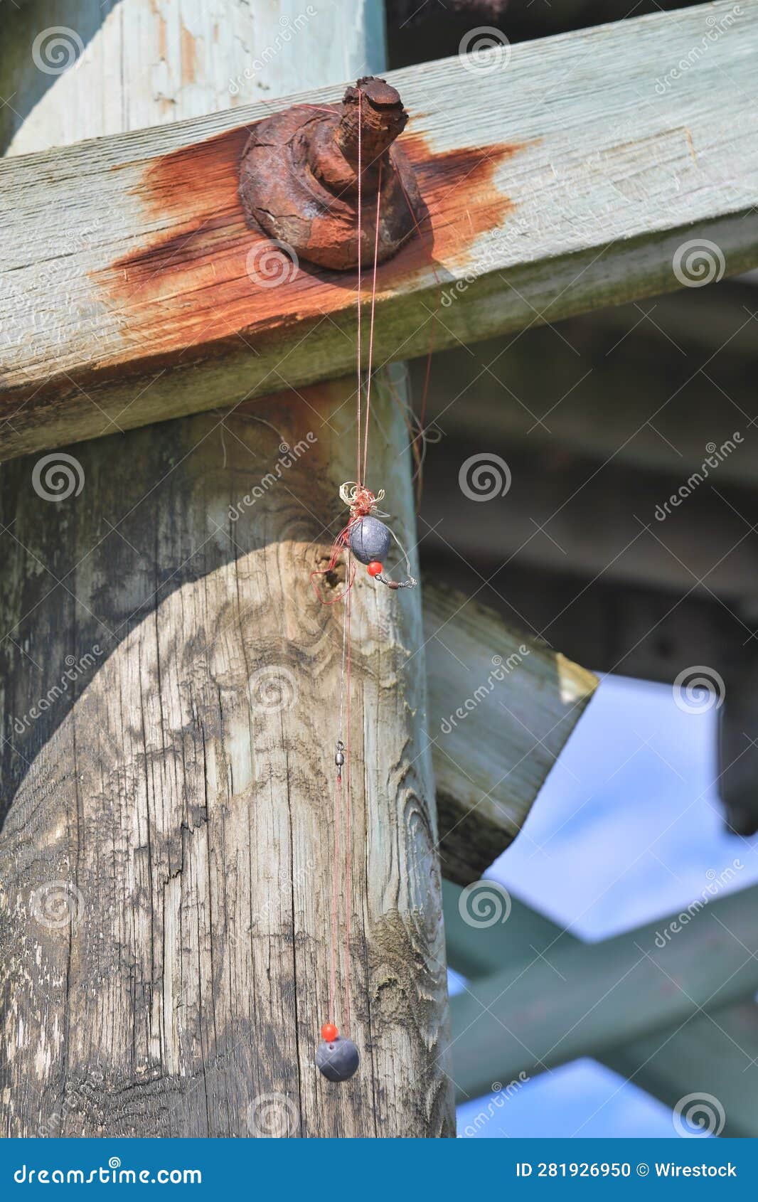 Fishing Line and Weight Snagged on the Pier by the Ocean Stock Photo Image of rocks, crashing