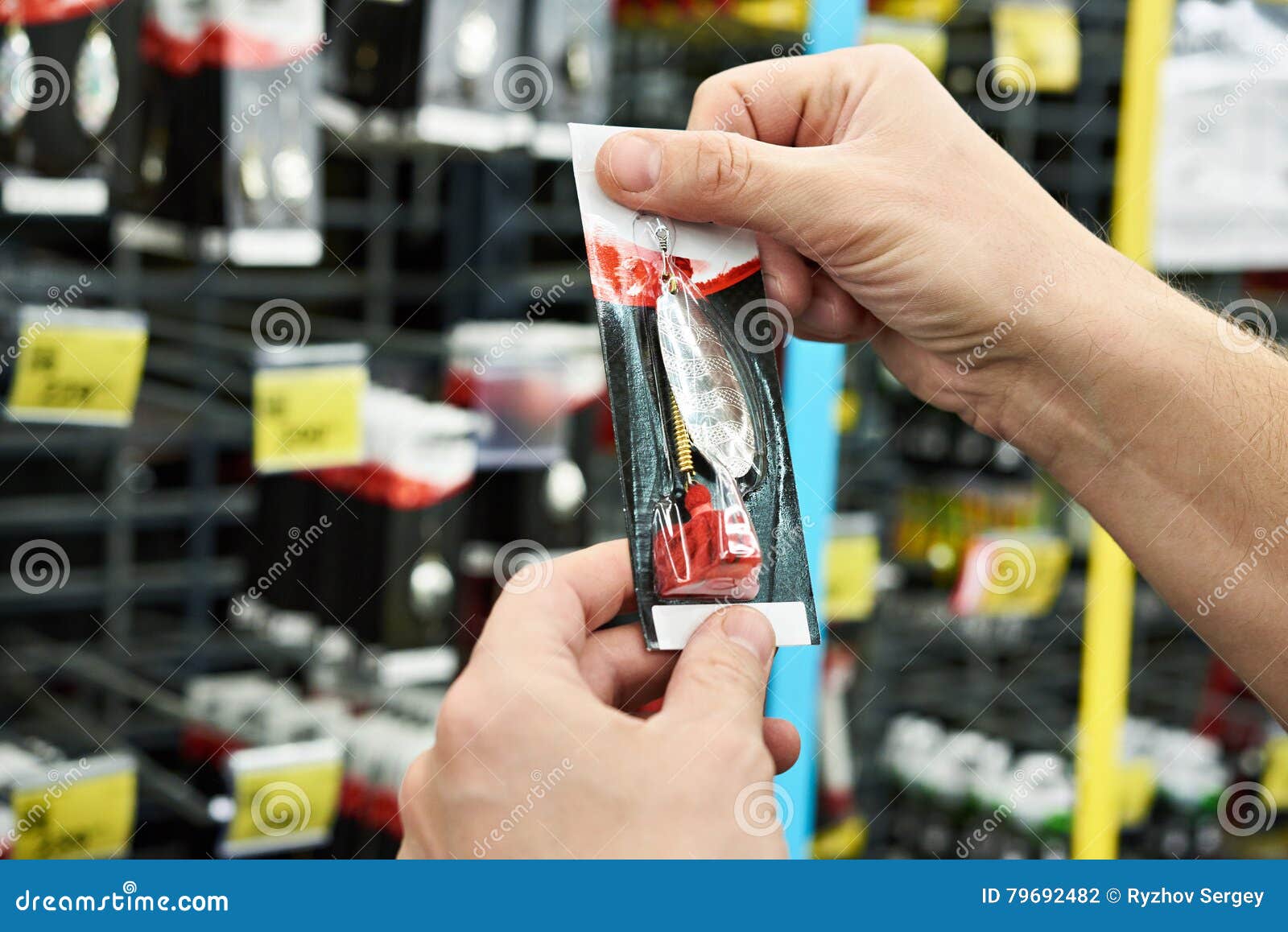 Fishing Lure Bait in Hands Man in Store Stock Photo Image of lead