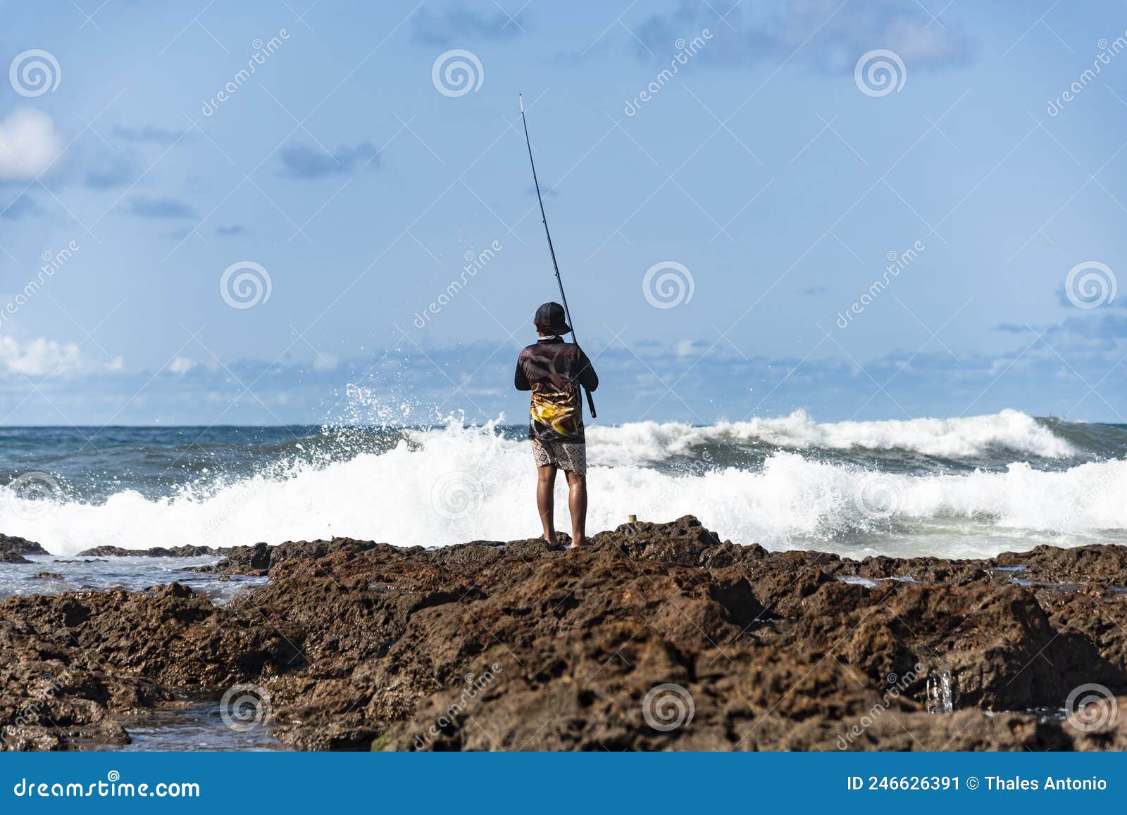 Fishing Men on Top of the Rocks of Beach Fishing with Pole Editorial Photo  - Image of landscape, capital: 246626391