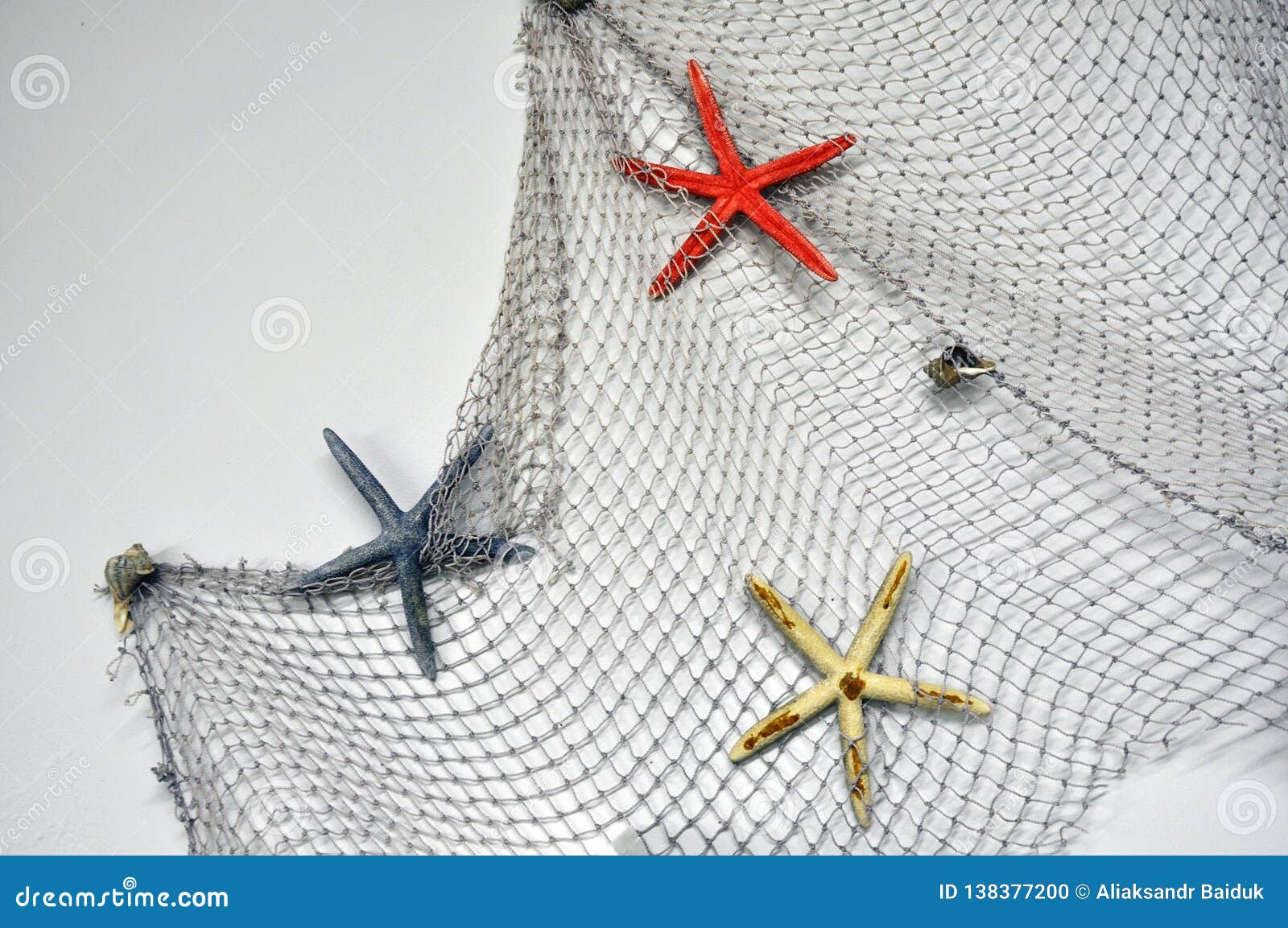 Fishing Net with Starfish, Maritime Nautical Decoration Over White  Background with Copy Space Stock Photo - Image of starfish, vacation:  138377200