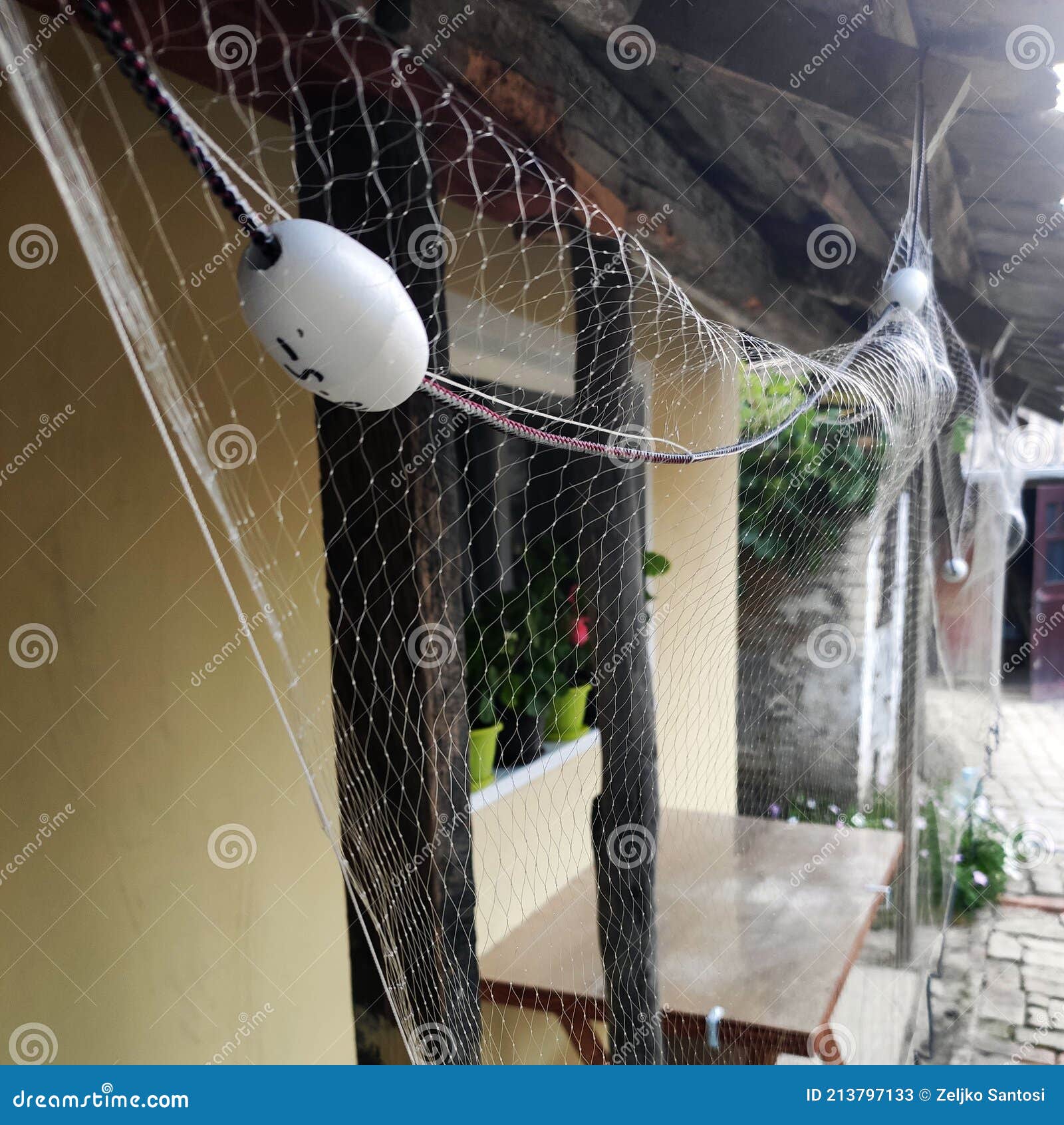 Fishing Net Hanged on the Roof Stock Image - Image of fishing, attached:  213797133