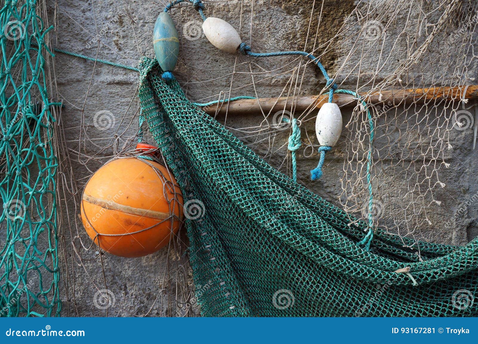 Fishing net on a wall. stock image. Image of green, nautical
