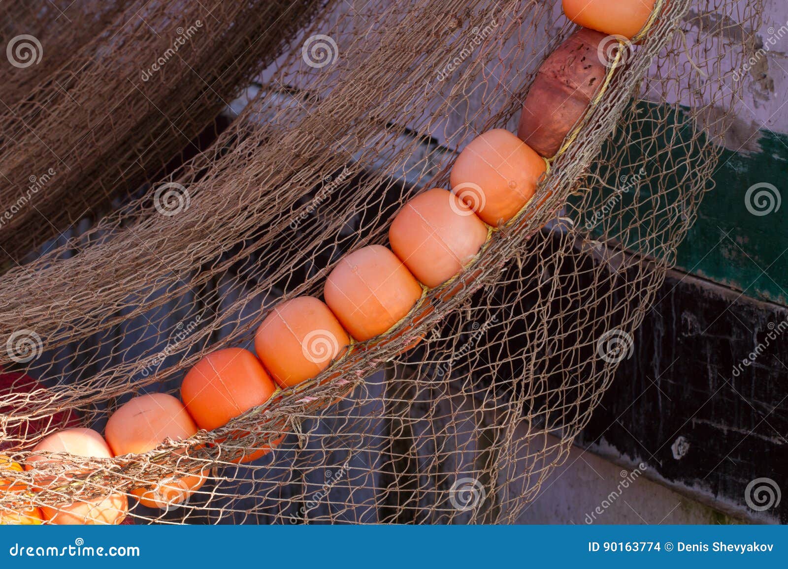 Fishing Nets with Bright Floats. Large Red Floats. Drying Fishing