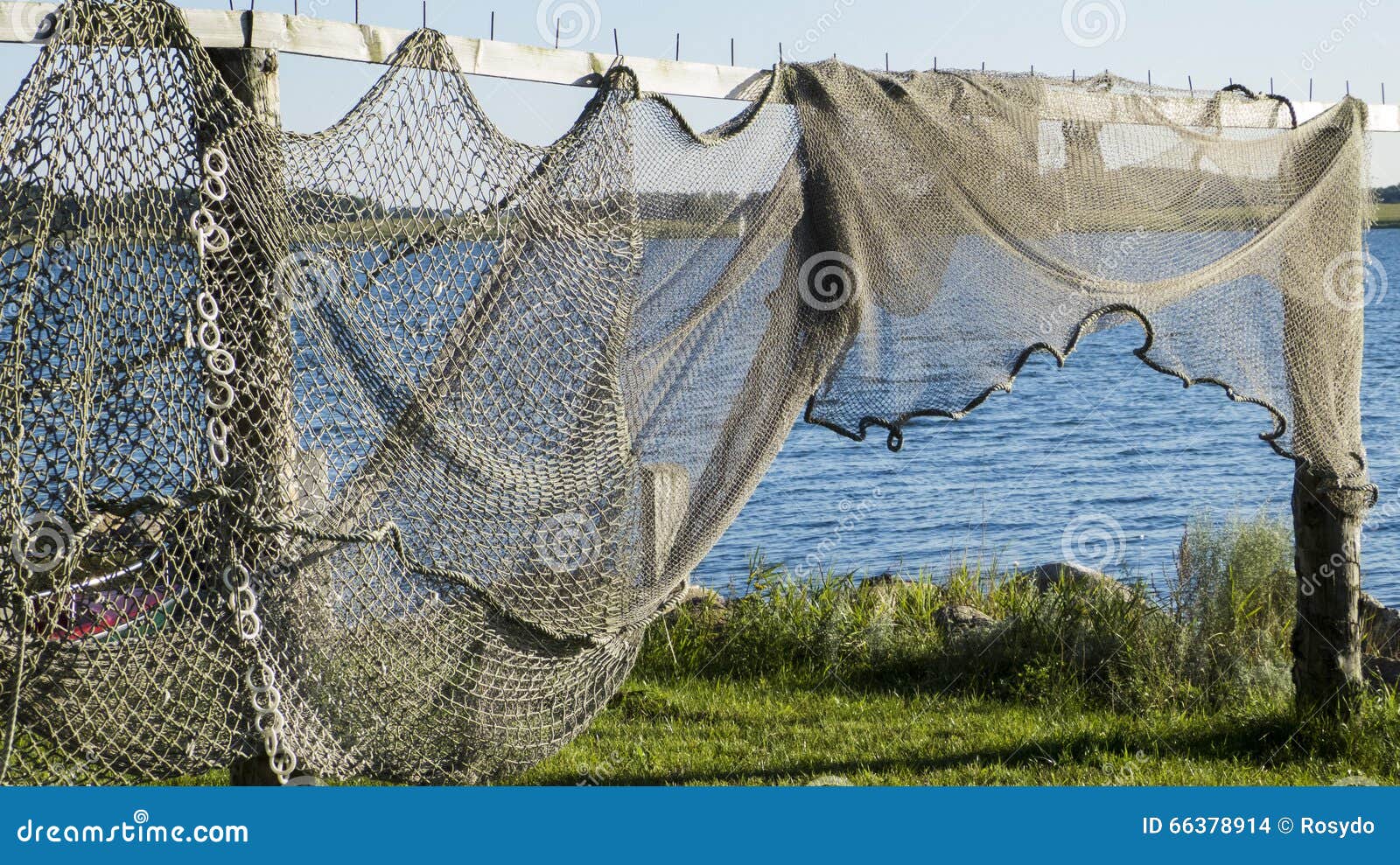 https://thumbs.dreamstime.com/z/fishing-nets-fish-traps-drying-wooden-rack-66378914.jpg