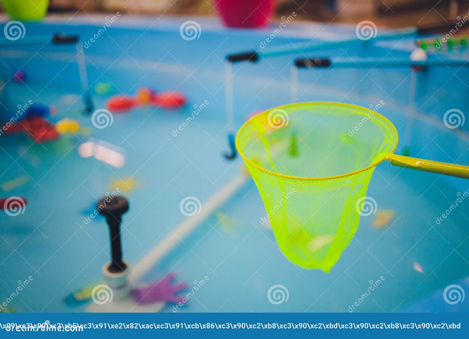 Fishing in the Paddling Pool. Children`s Toys in the Pool. Toy Fish Fishing  Rod Stock Photo - Image of game, baby: 205615504