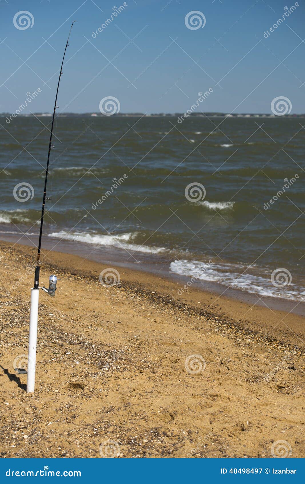 Fishing pole on the beach stock image. Image of vacation - 40498497