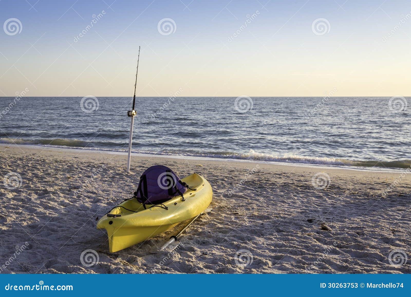 Fishing Pole and Canoe on the Beach Stock Image - Image of canoe ...