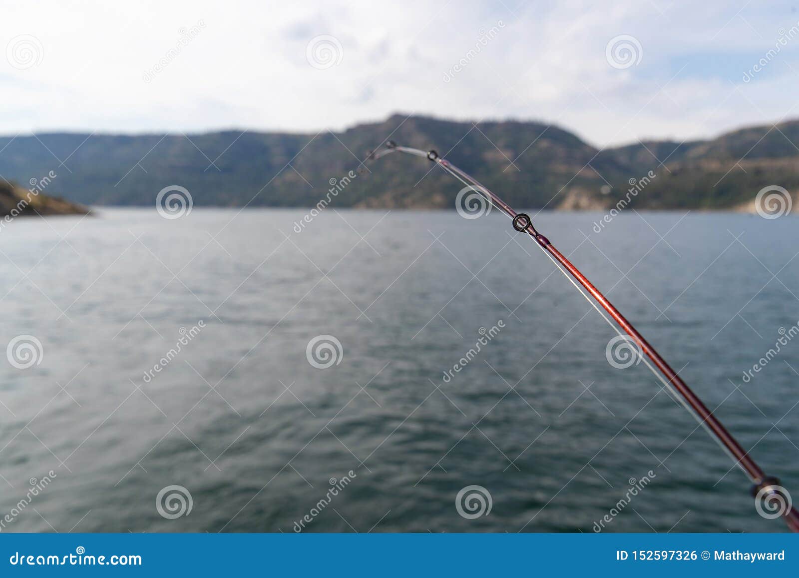 Fishing Pole with Line in the Water on Lake Roosevelt in Washington State  Stock Photo - Image of lake, vacation: 152597326