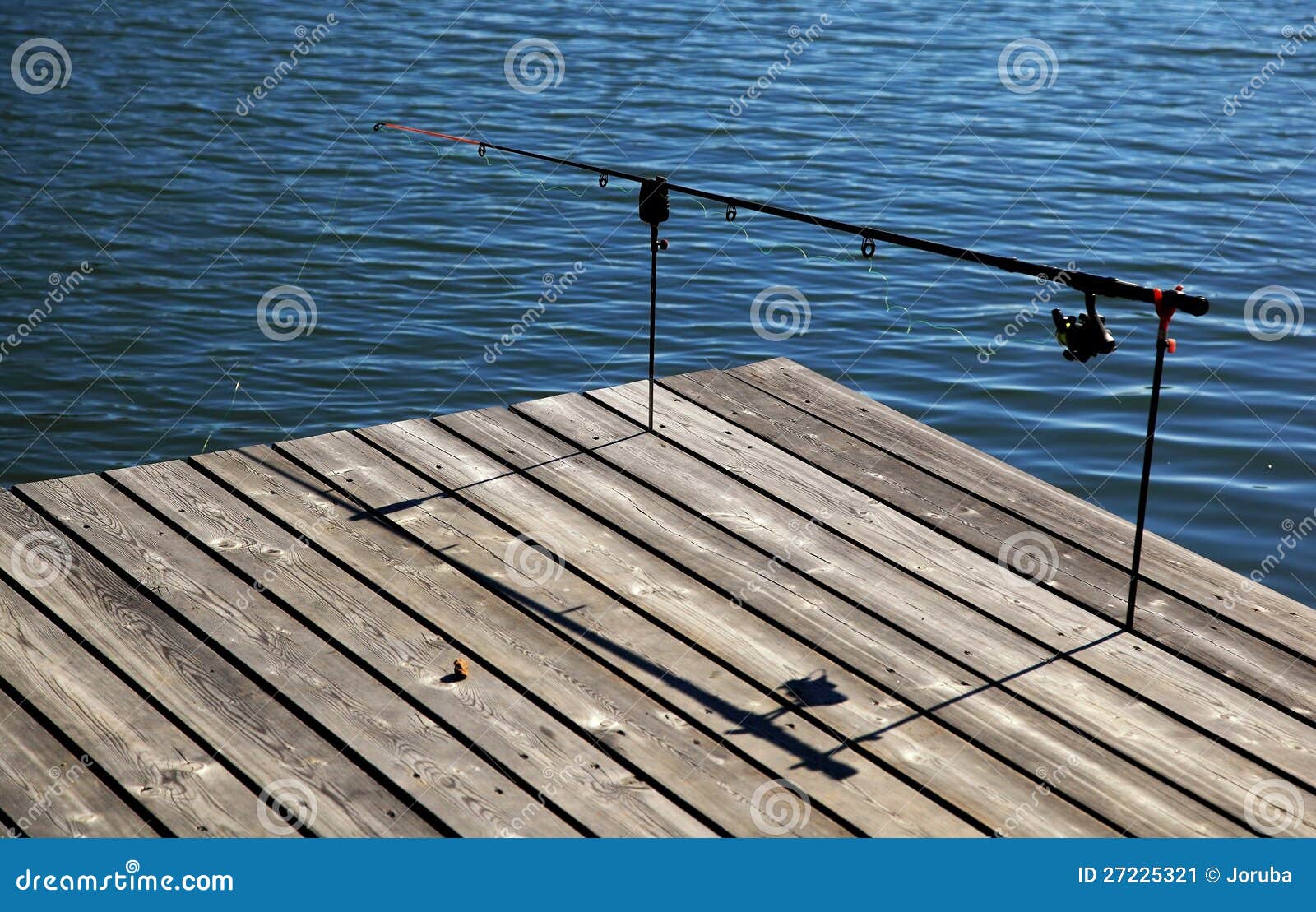 Fishing pole on pier stock image. Image of pursuit, carefree - 27225321