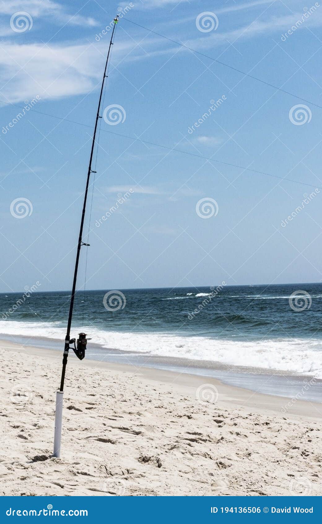 Fishing Pole Standing Upright in Holder in the Sand on Fire Island New York  Stock Photo - Image of fishing, copy: 194136506