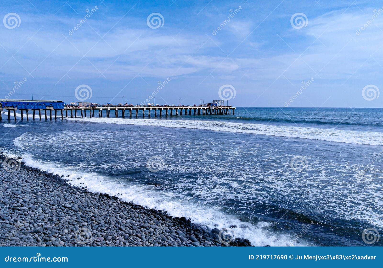 fishing port with spectacular blue ocean with foam. port of la libertad, el salvador