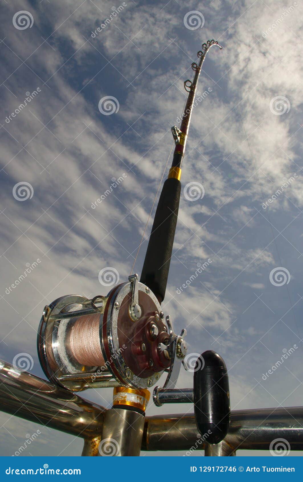 Fishing Rod on the Back of a Boat Stock Photo - Image of clouds, holder:  129172746
