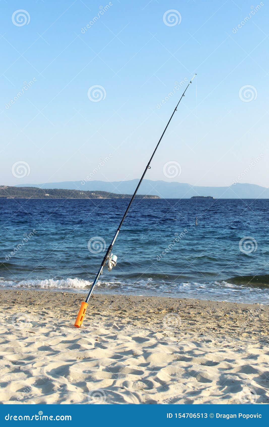 Fishing rod on beach shore stock image. Image of silhouette 154706513