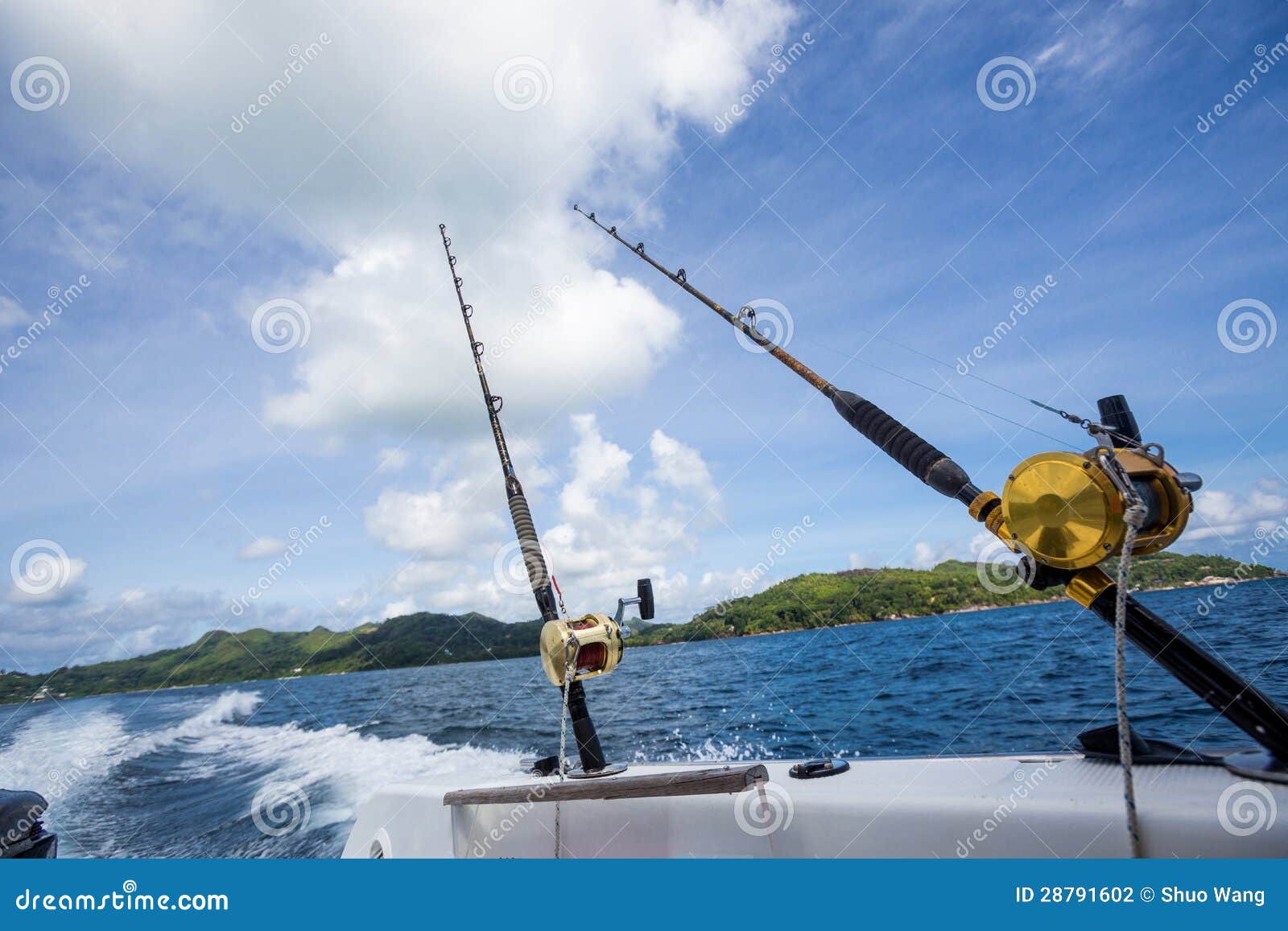 Fishing rod on boat at sea stock photo. Image of recreational 28791602