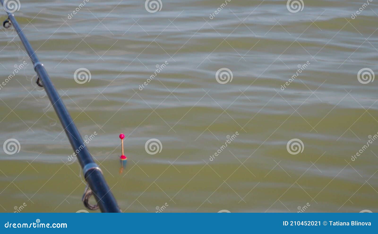 Fishing with Fishing Rod. Float with a Hook on a Fishing Line