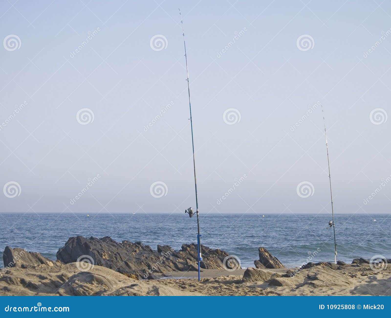 Fishing Rod on the Rocks of the Sea Stock Photo Image of landscape
