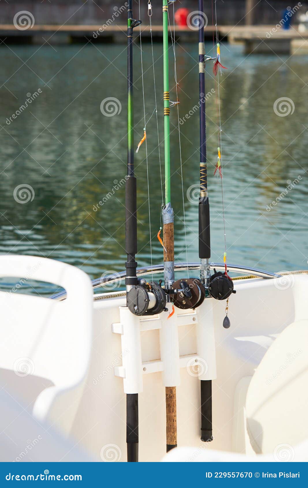 Fishing Rods with Hooks on the Boat in Natural Setting. CloseupFishing Rods  with Hooks on the Boat in Natural Setting Stock Photo - Image of fishing,  closeup: 229557670