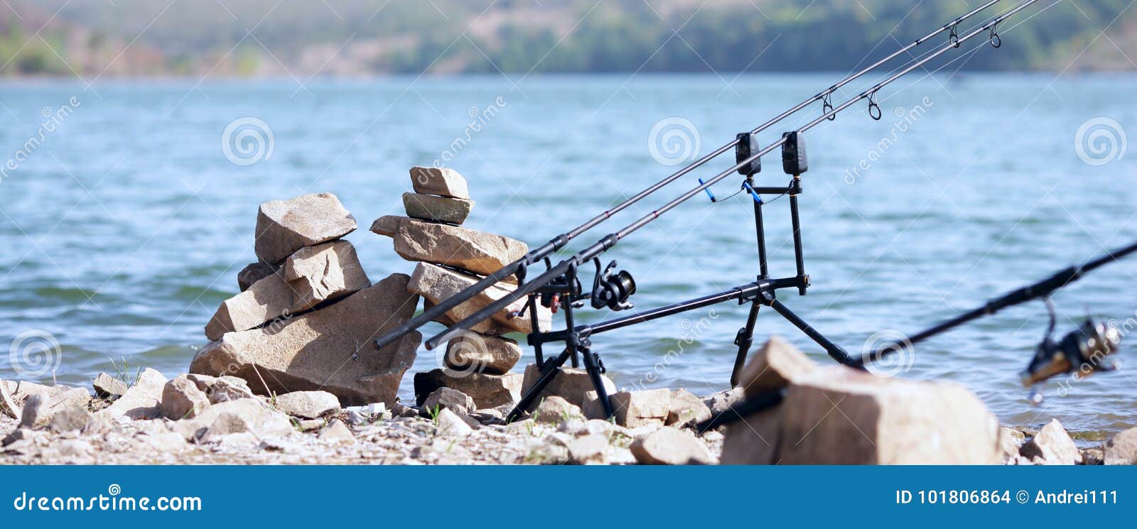 Fishing rods on the lake stock photo. Image of pursuit 101806864