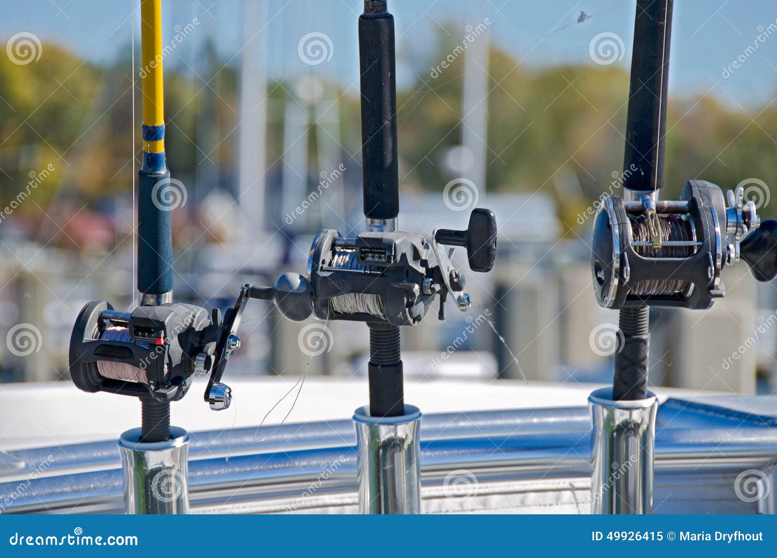 Fishing rods and reels stock image. Image of recreation 49926415