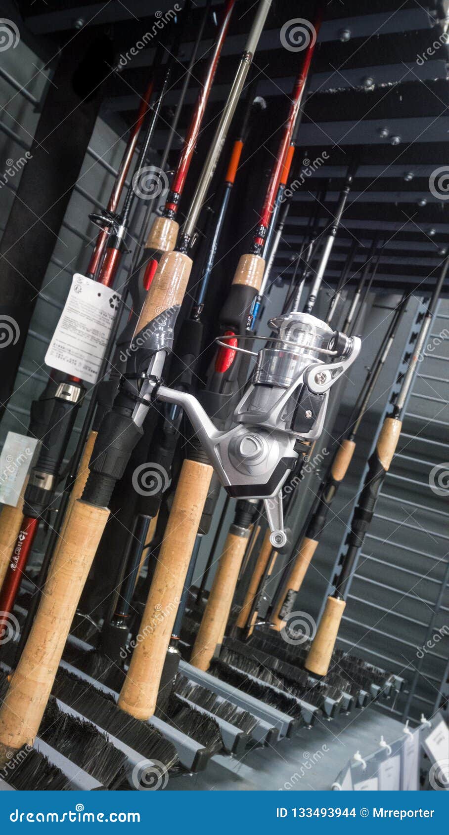 Fishing rods at sale editorial stock image. Image of stand - 133493944