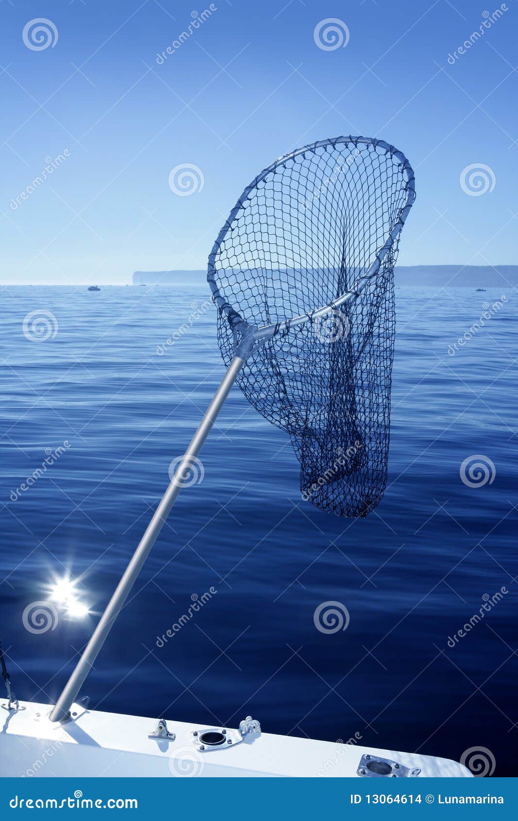 https://thumbs.dreamstime.com/z/fishing-scoop-net-boat-blue-sea-13064614.jpg