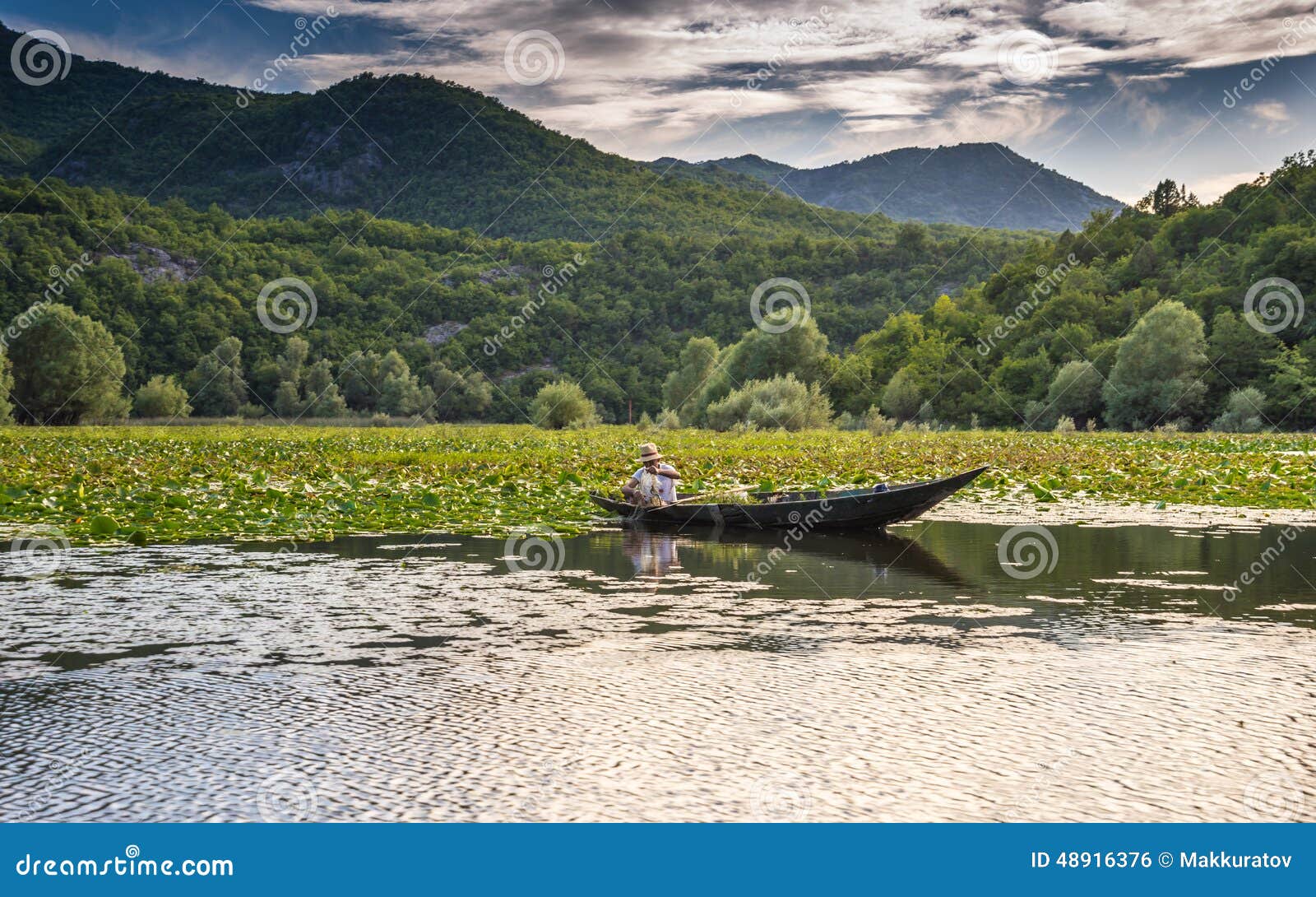 Fishing in Skadar lake editorial photo. Image of rock - 48916376