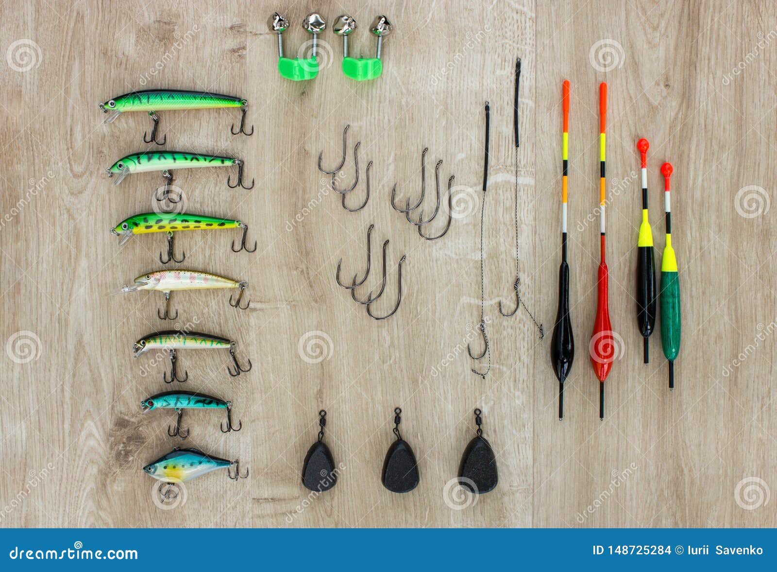 https://thumbs.dreamstime.com/z/fishing-tackle-float-lures-weights-bells-beautiful-wooden-background-concept-148725284.jpg