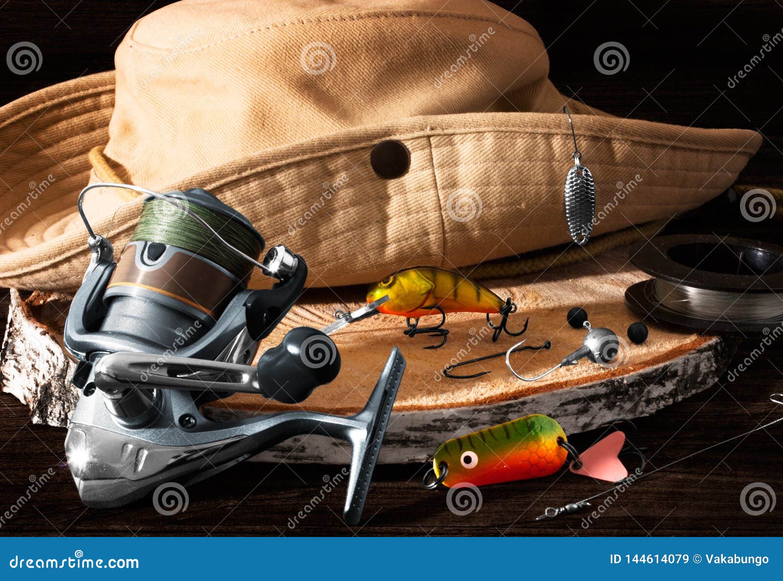 Fishing Tackle. Hook, Hat, Fishing Reel, Lures on Darken Wooden Background.  Still Life Stock Image - Image of hobby, lures: 144614079