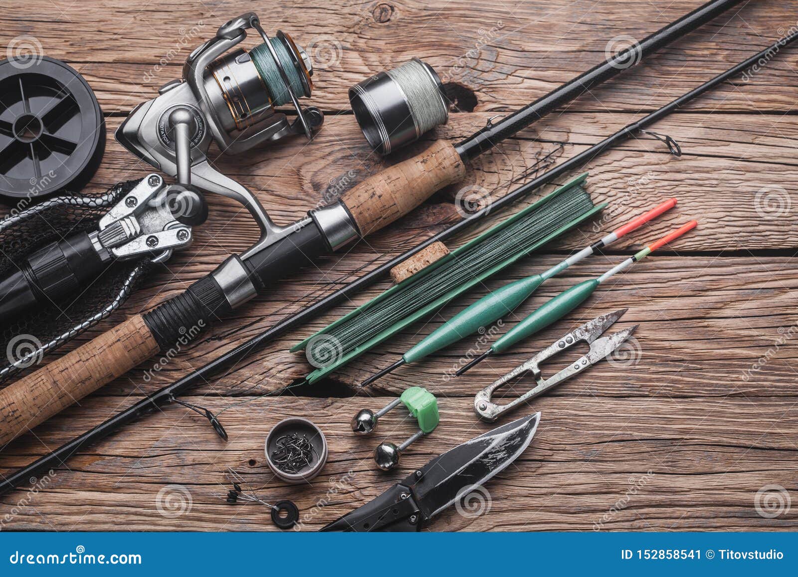 https://thumbs.dreamstime.com/z/fishing-tackle-peaceful-fish-float-rod-reel-line-wooden-background-152858541.jpg