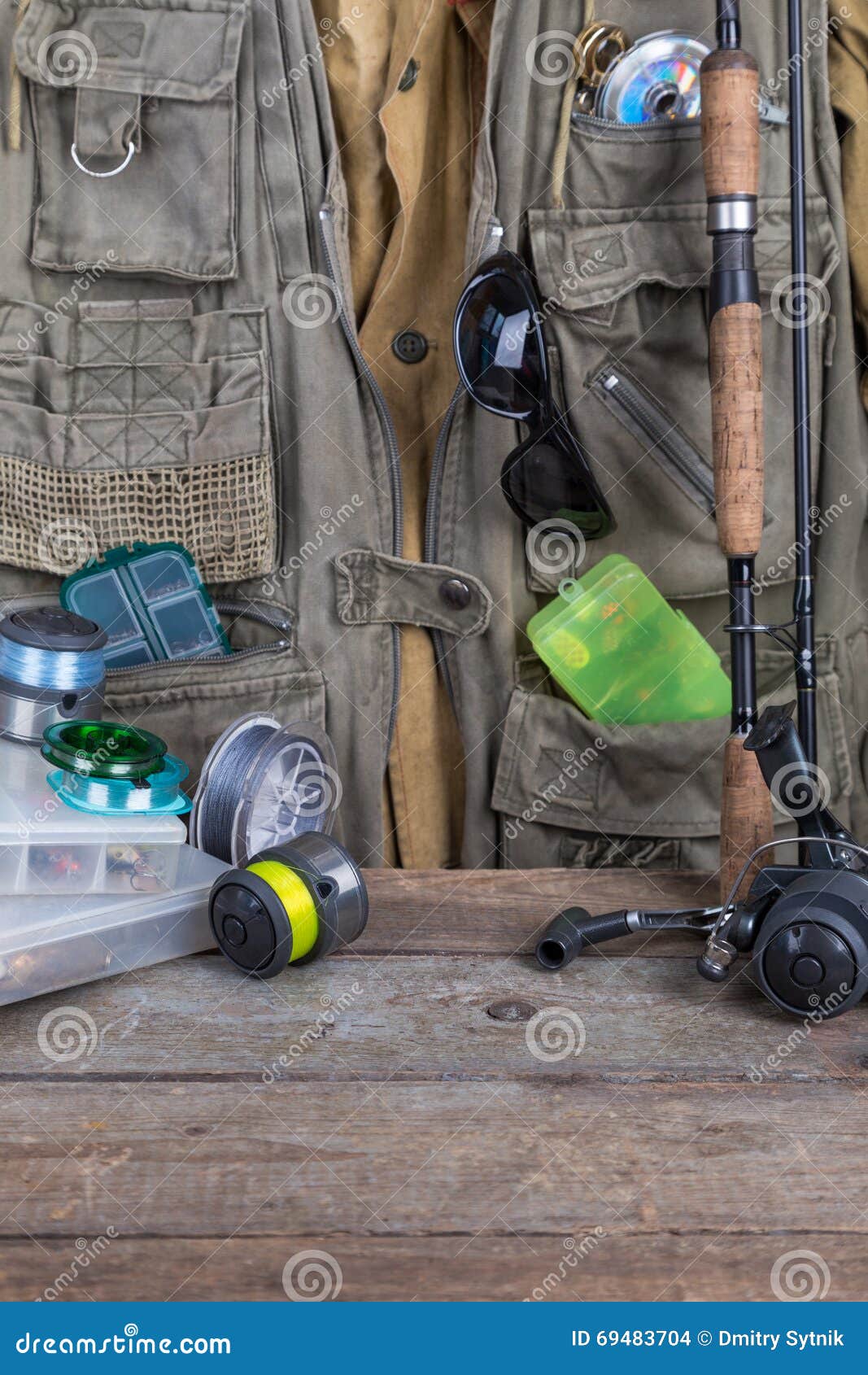 Fishing Tackles with Fishing Vest and Wooden Stock Photo - Image of ...