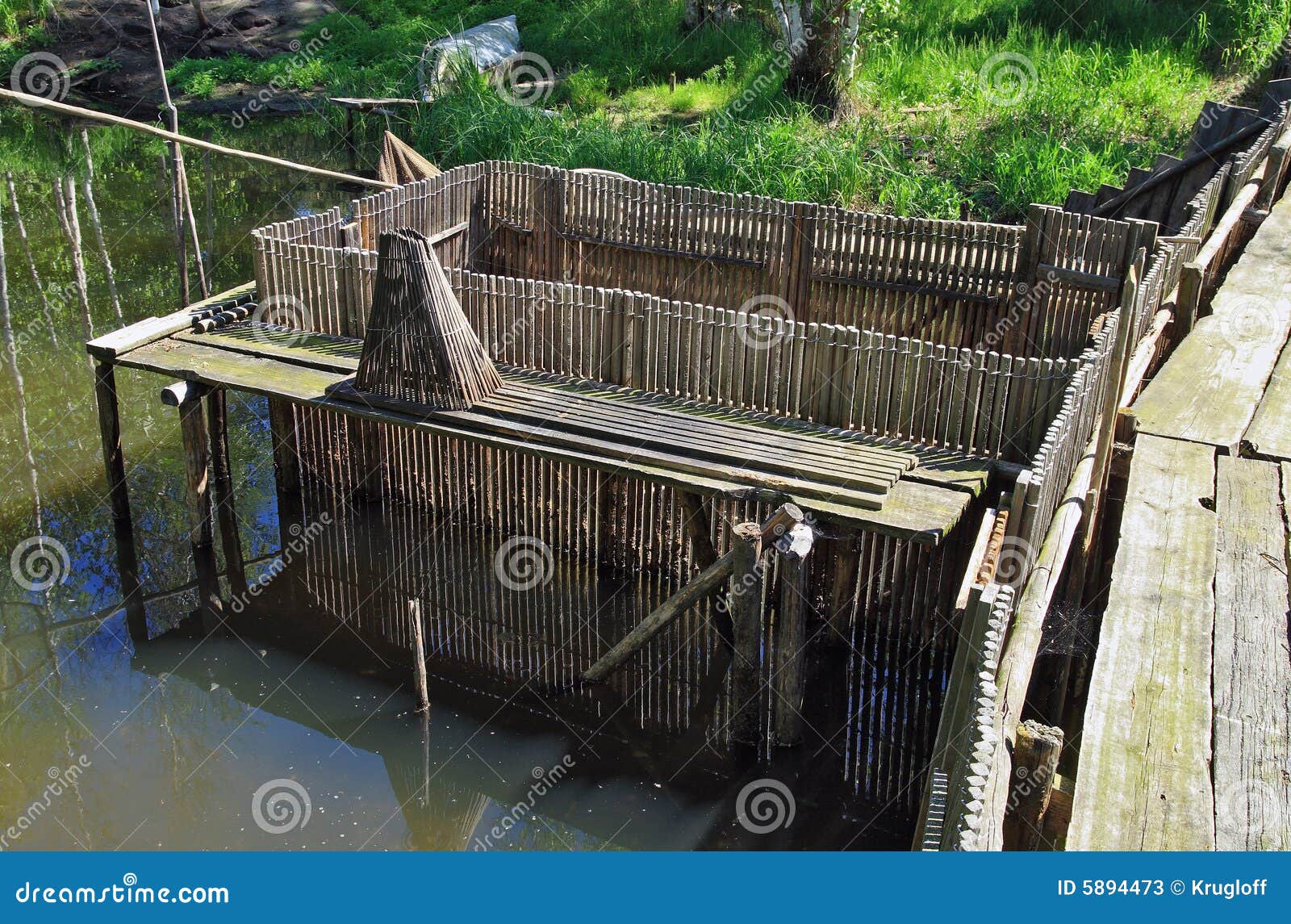 Fishing trap on the river stock image. Image of weaving 5894473