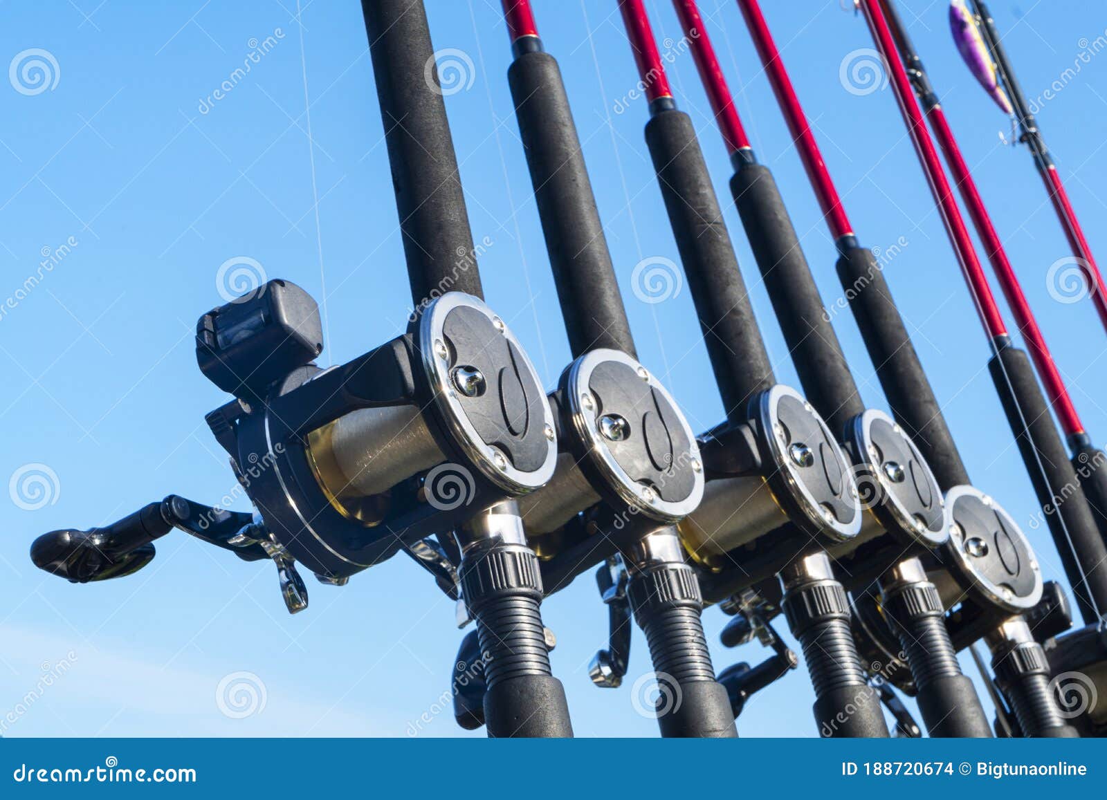 Fishing Trolling Boat Rods in Rod Holder. Big Game Fishing. Fishing Reels  and Rods Pattern on Boat Stock Photo - Image of coast, angler: 188720674