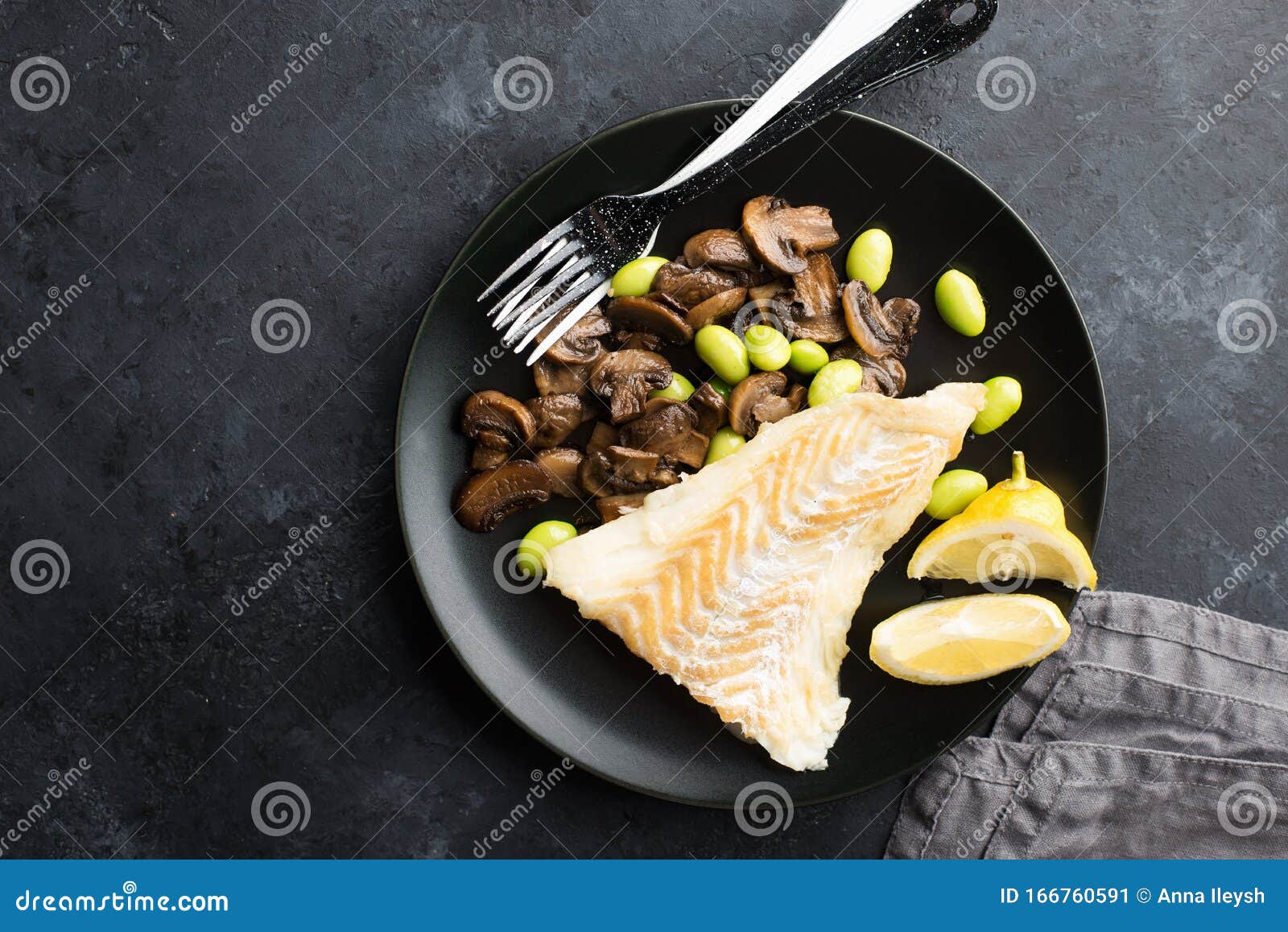 Fishplate. Sea White Cod Fish with a Side Dish of Vegetables and Mushrooms on a Plate. Top View